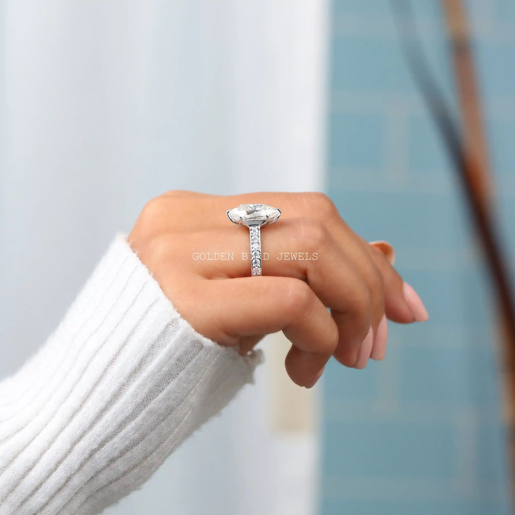 In finger side view of marquise cut  engagement ring
