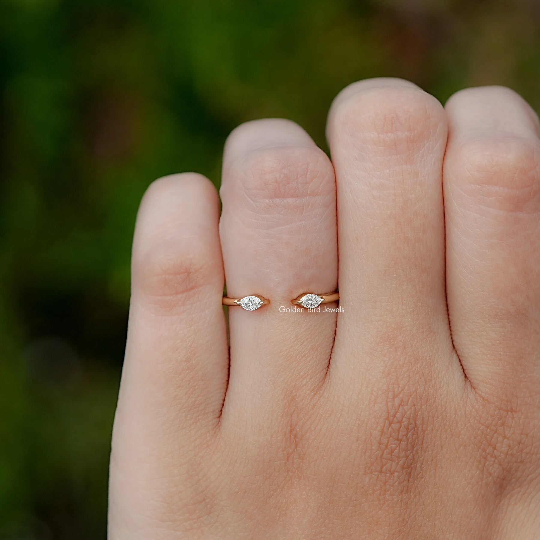 In finger front view of Open Cuff Two Stone Ring engagement ring