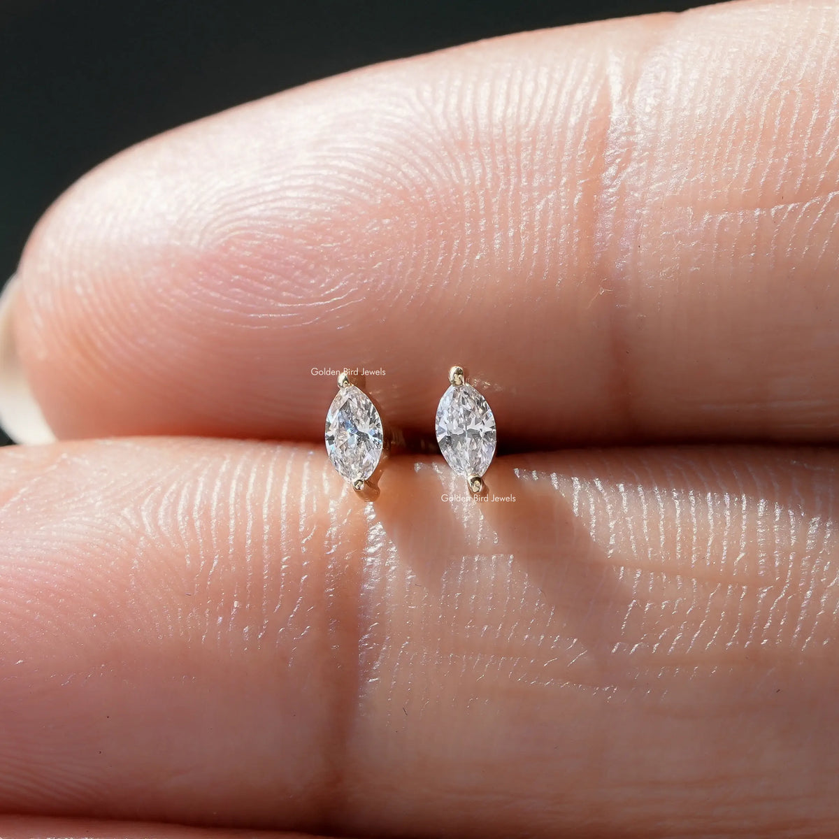 Pair Of a LGD Marquise Cut Diamond Solitaire Earrings