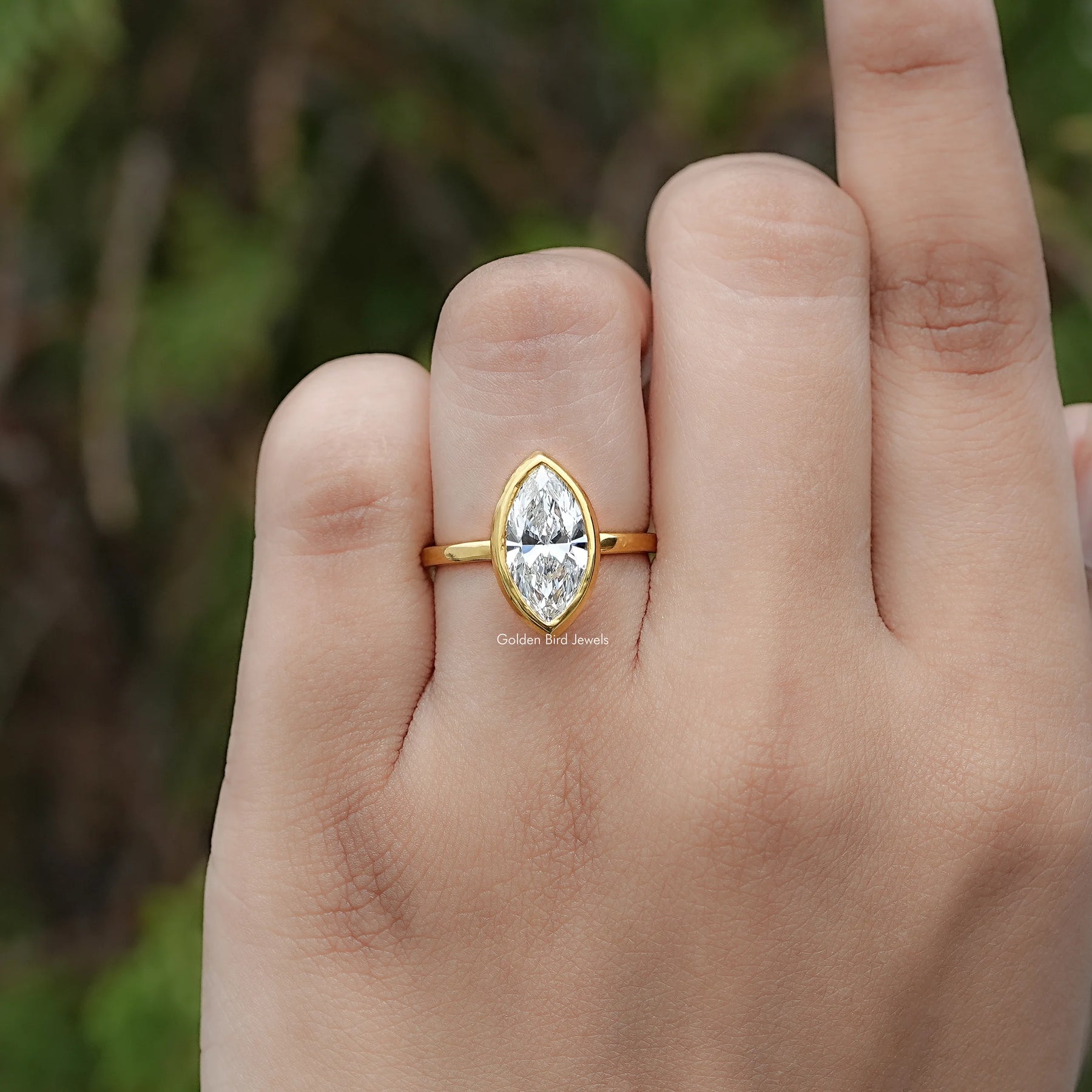 Front view of Marquise Diamond Bezel Set Ring