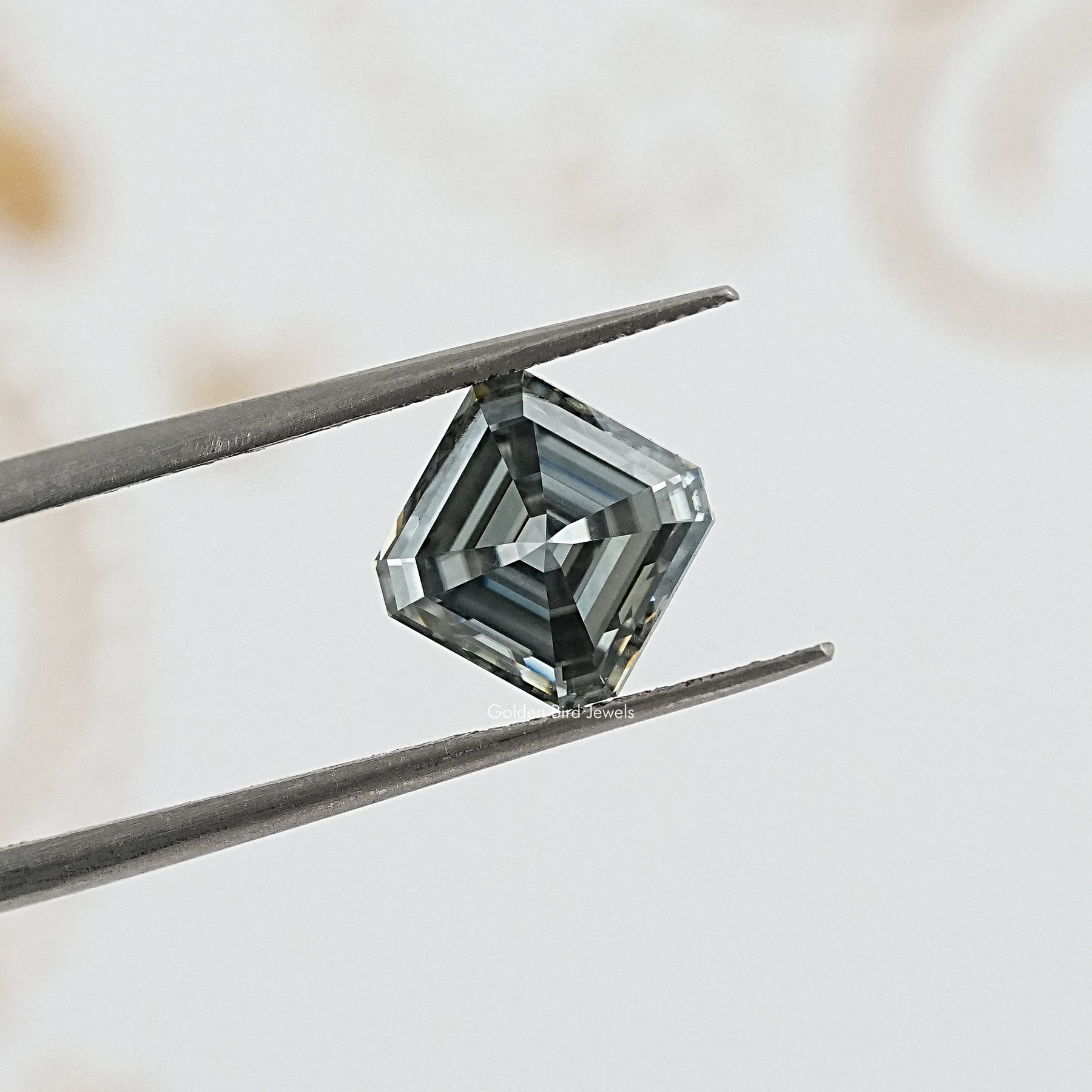 tweezers View of Gray Asscher Cut Moissanite Gem