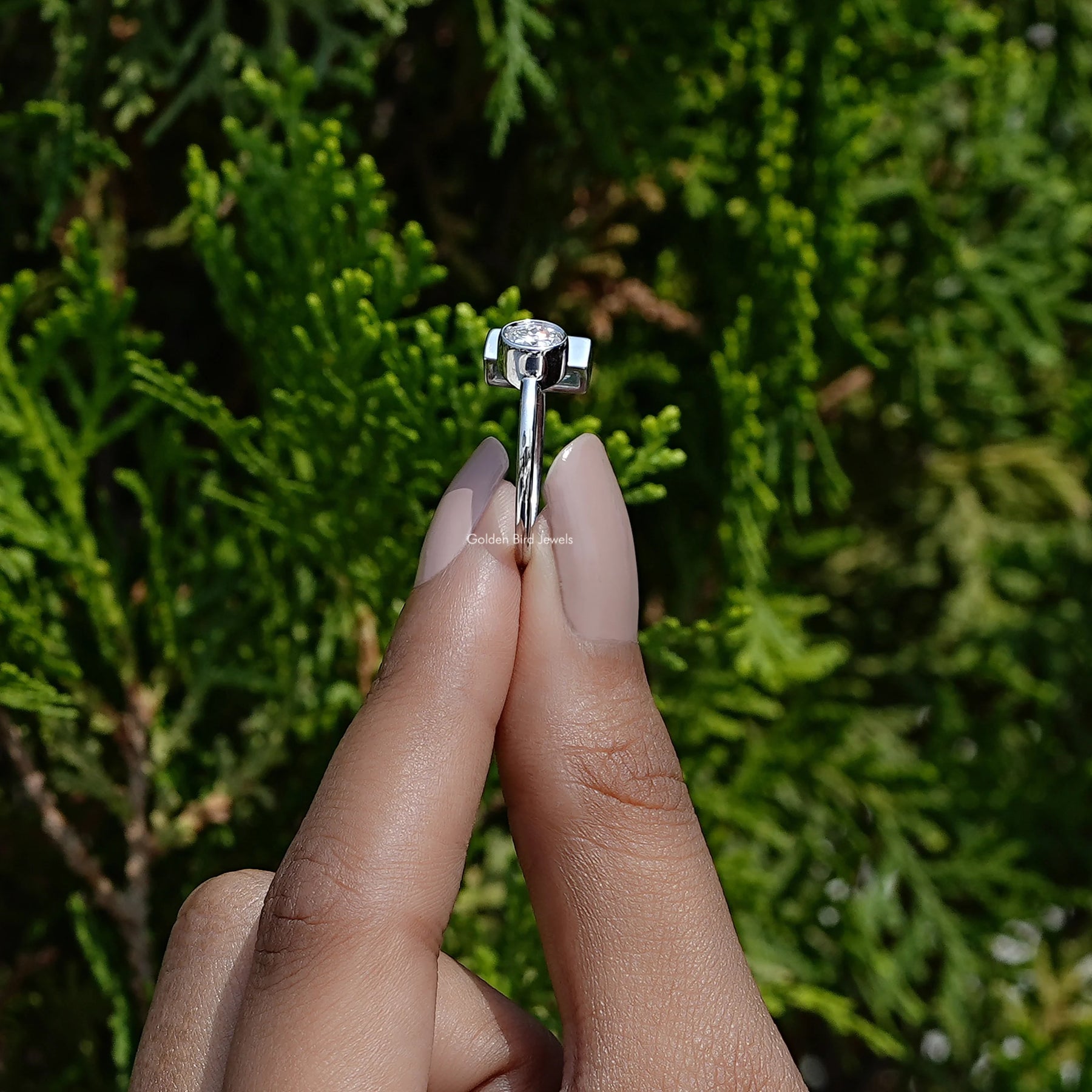 In Finger view of baguette cut moissanite halo Ring