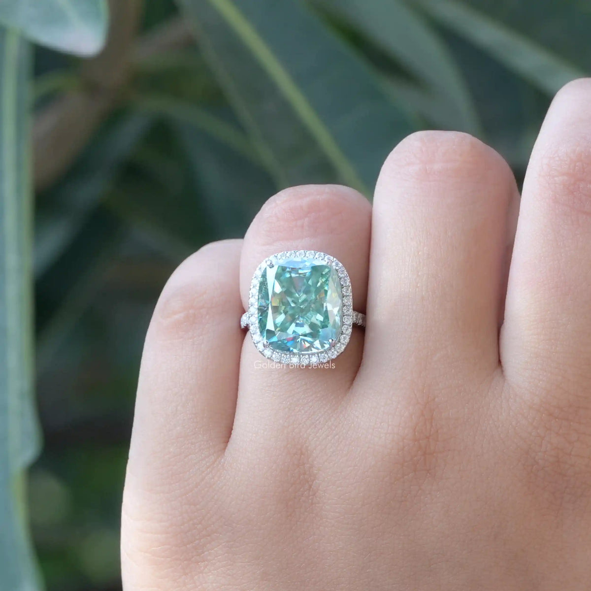 Detailed View Of Moissanite Round and Cushion Cut Ring In White Gold