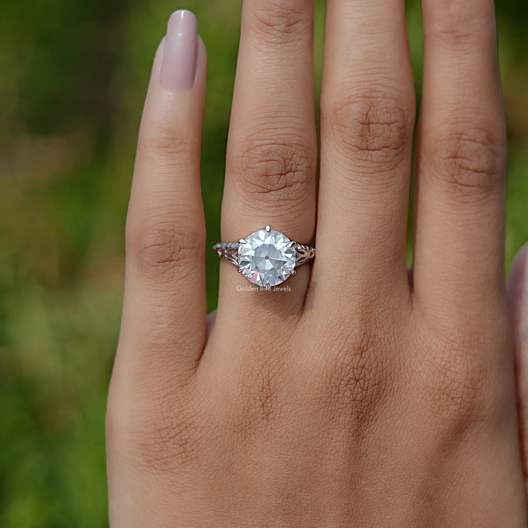 View of Old European Round Cut Engagement Ring In Finger