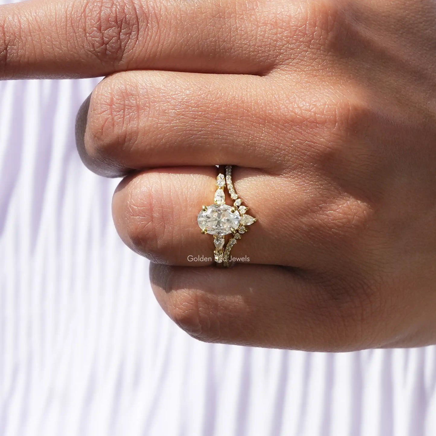View of Oval Cut Moissanite Accent Stone Ring In finger