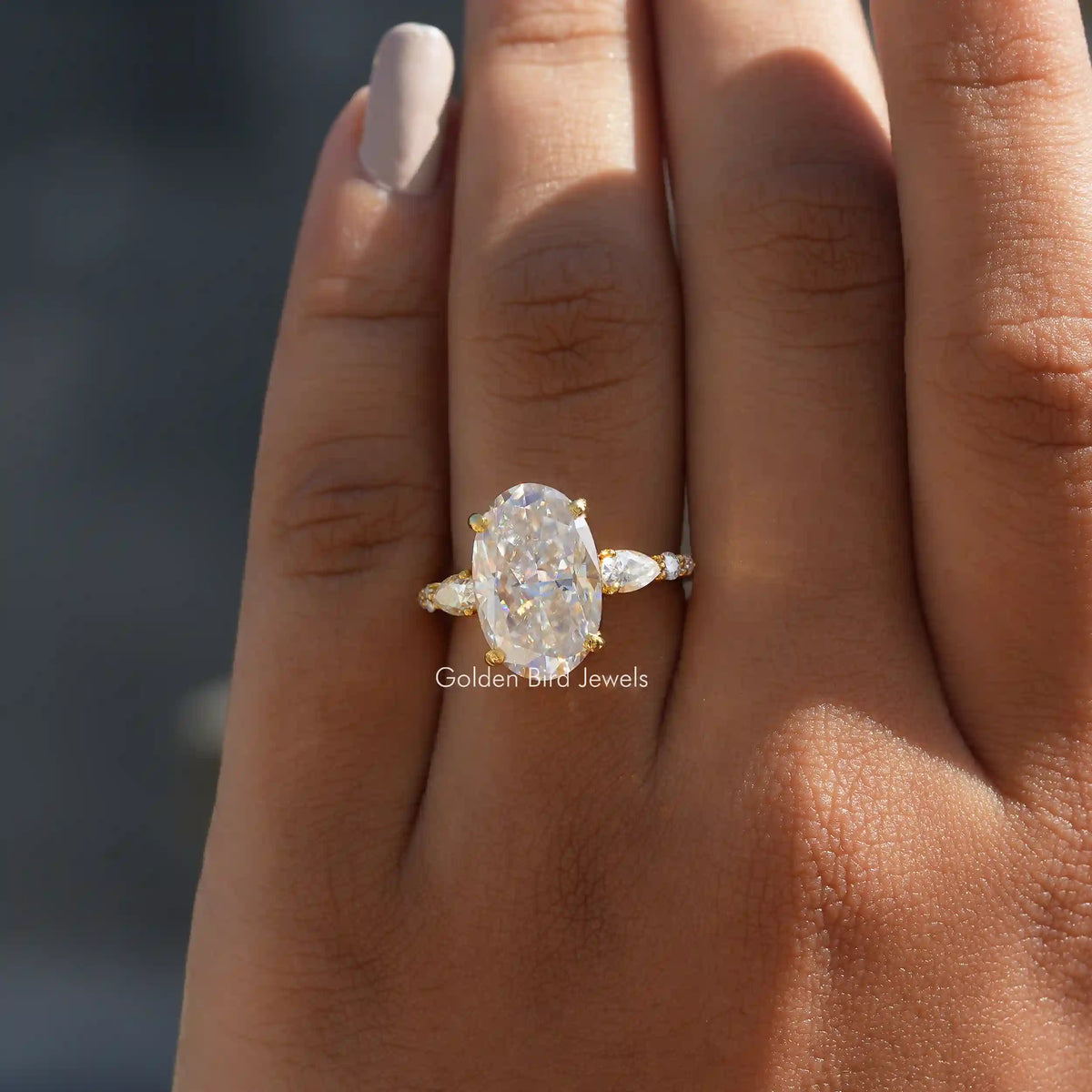 Oval Cut Moissanite Engagement Ring In Yellow Gold