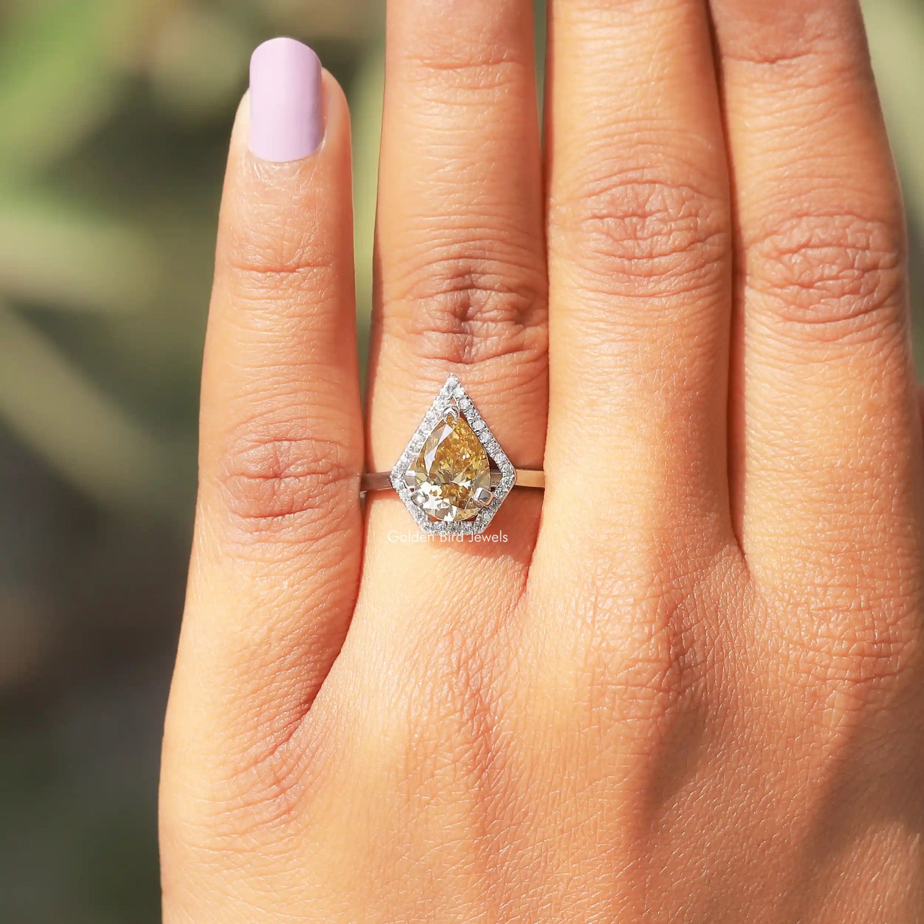 Moissanite Pear Shaped Halo Ring In White Gold