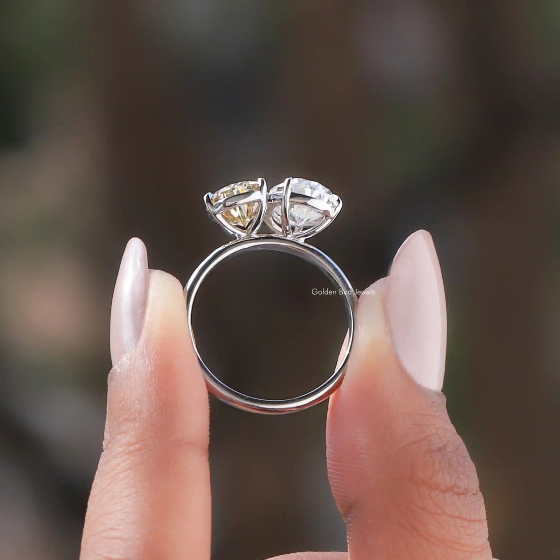 Back View of Pear Cut Toi Et Moi Bridal Ring In two fingers