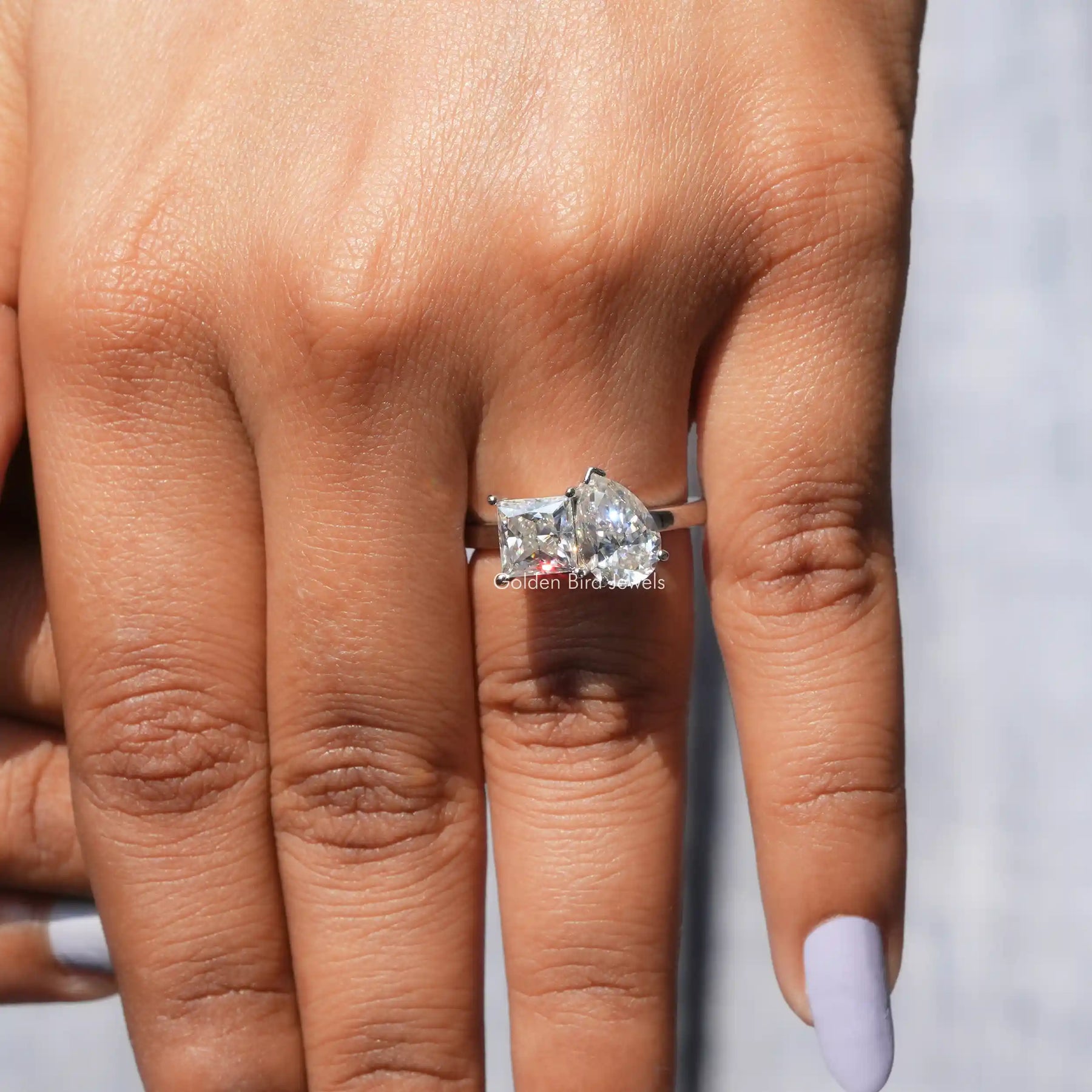 View of Toi Et Moi Pear And Princess Cut White Gold Ring