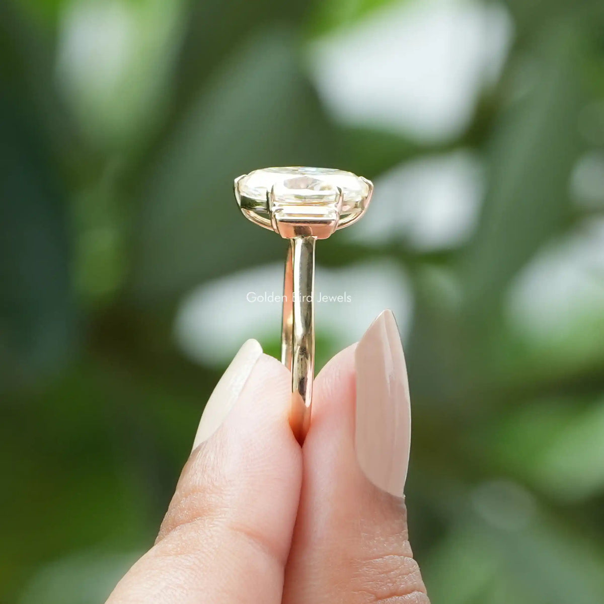 Side view of halo moissanite engagement ring crafted in Prongs setting