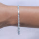 Close up View of Emerald and Round Cut Diamond Tennis Bracelet