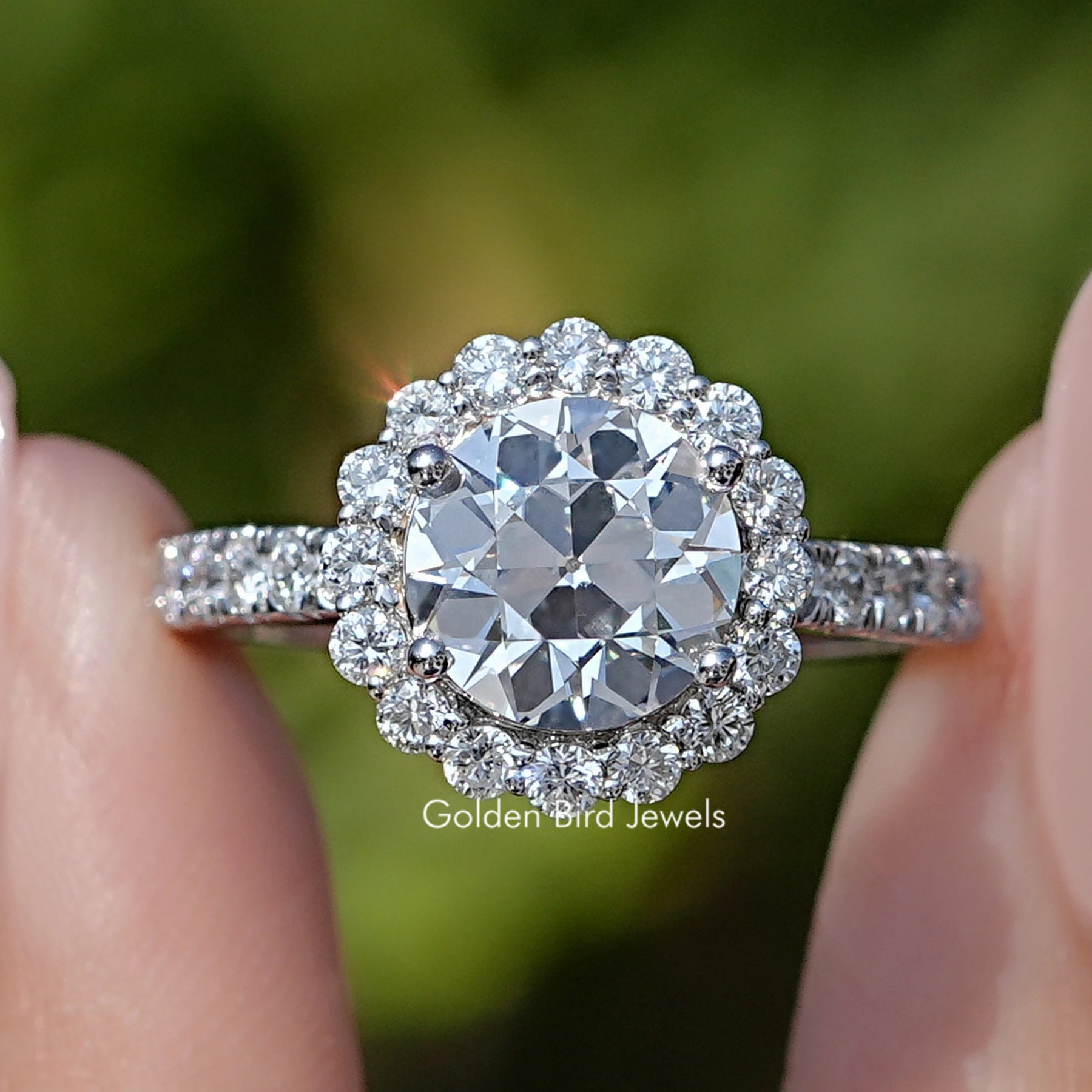 Front view of Old European Round Lab Diamond Halo Accent Ring in two fingers