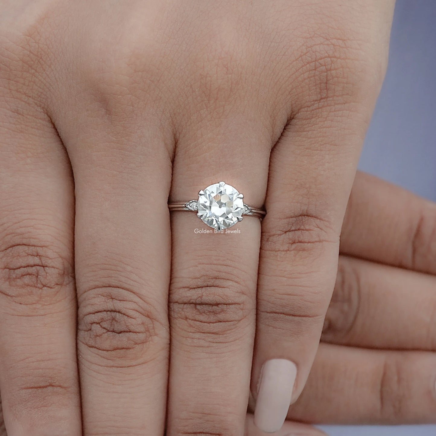 View of Round Cut Solitaire Engagement Ring in prongs setting
