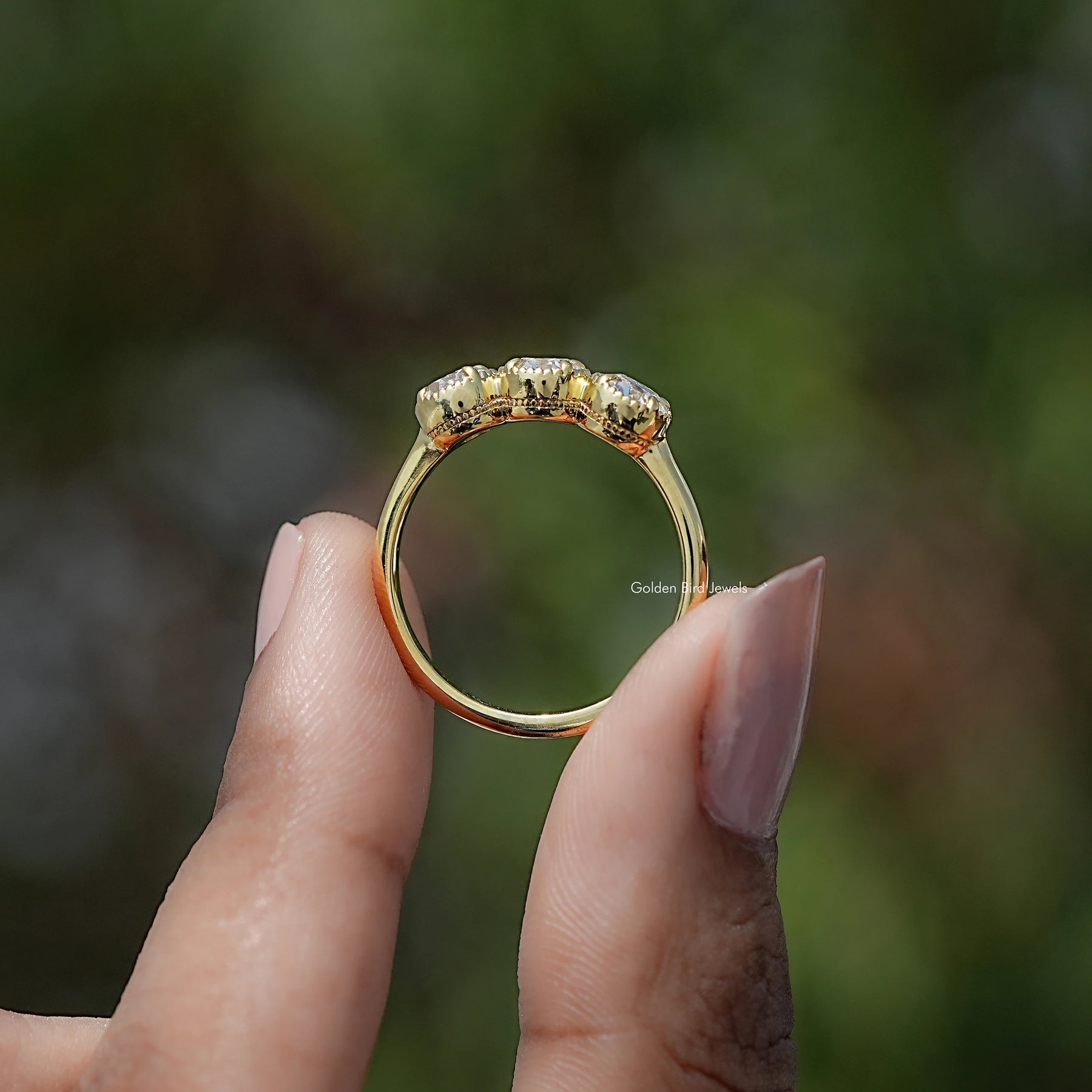 Back view of European Cut Moissanite Solitaire Ring in secure setting