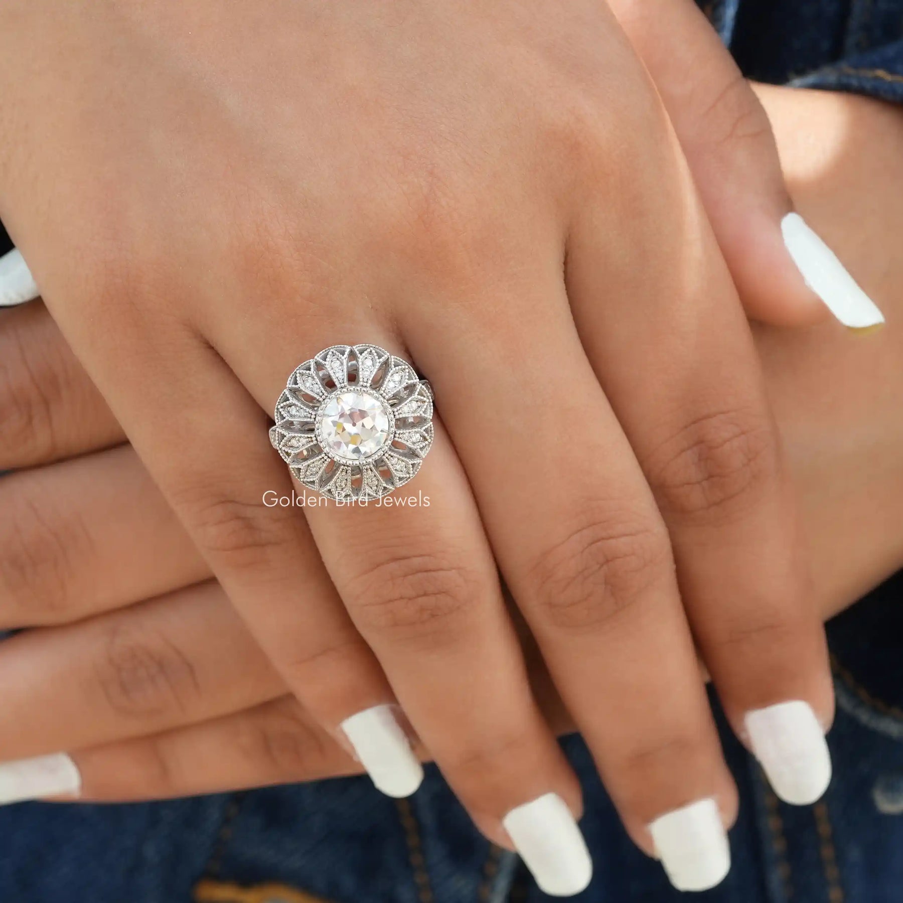 View of Round Cut Floral Style Vintage Ring In Finger