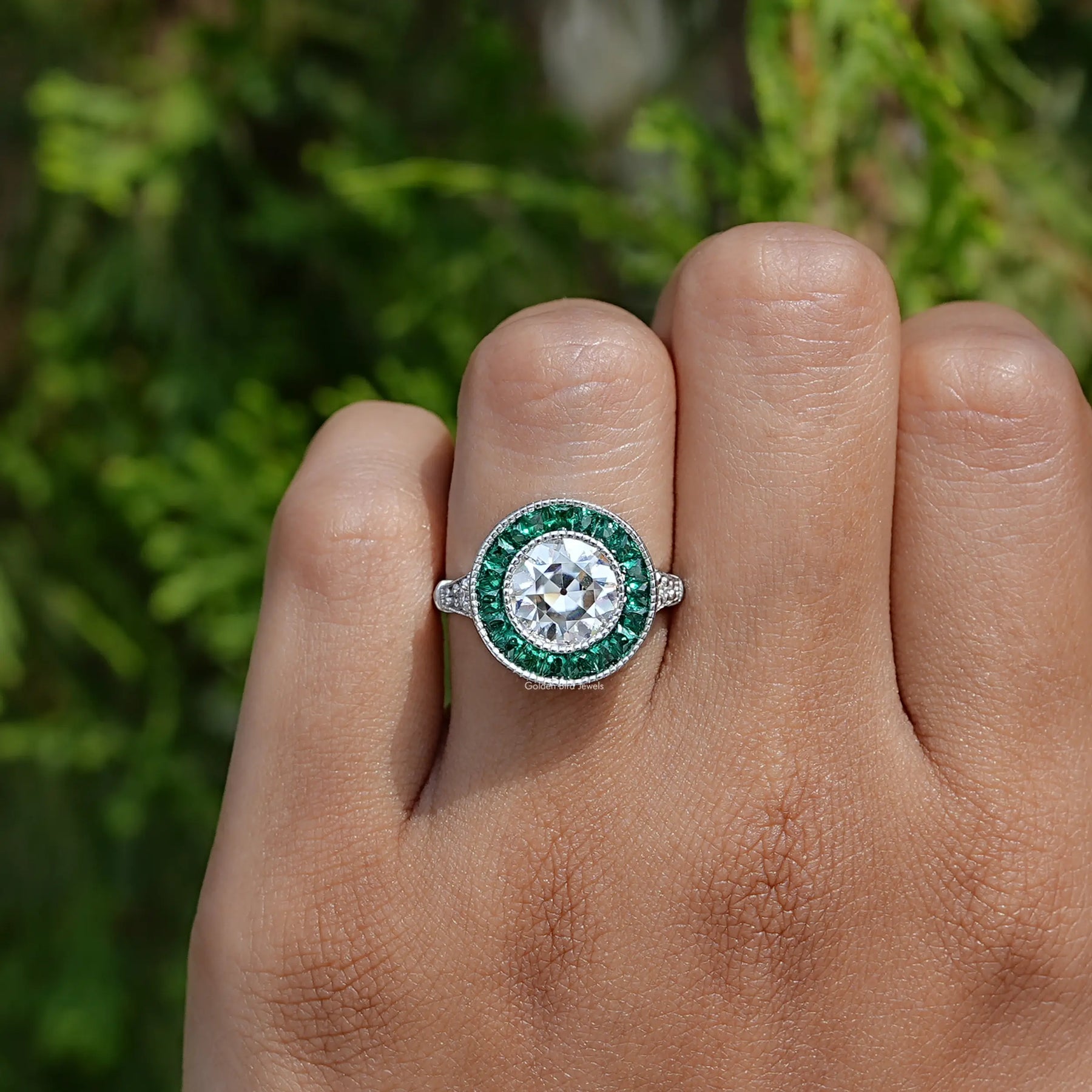 Detailed View Of Round Cut Moissanite Engagement Ringā In White Gold