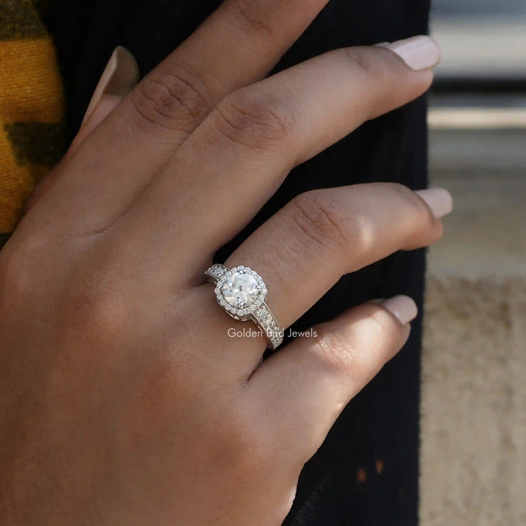 View of Round Cut Moissanite Halo Engagement Ring In Finger