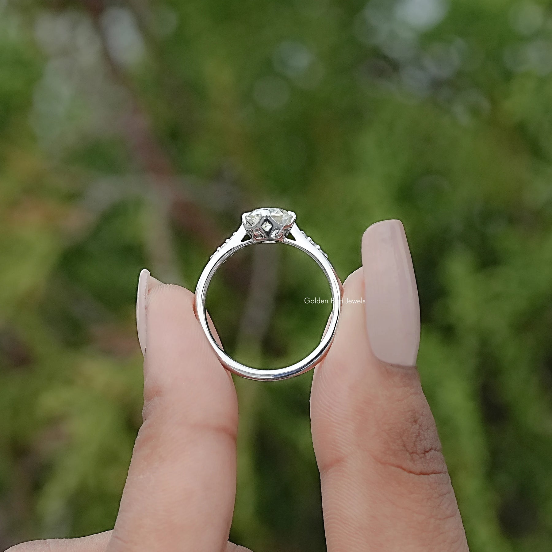 Back view of Old European Round Moissanite Solitaire Ring in secure setting