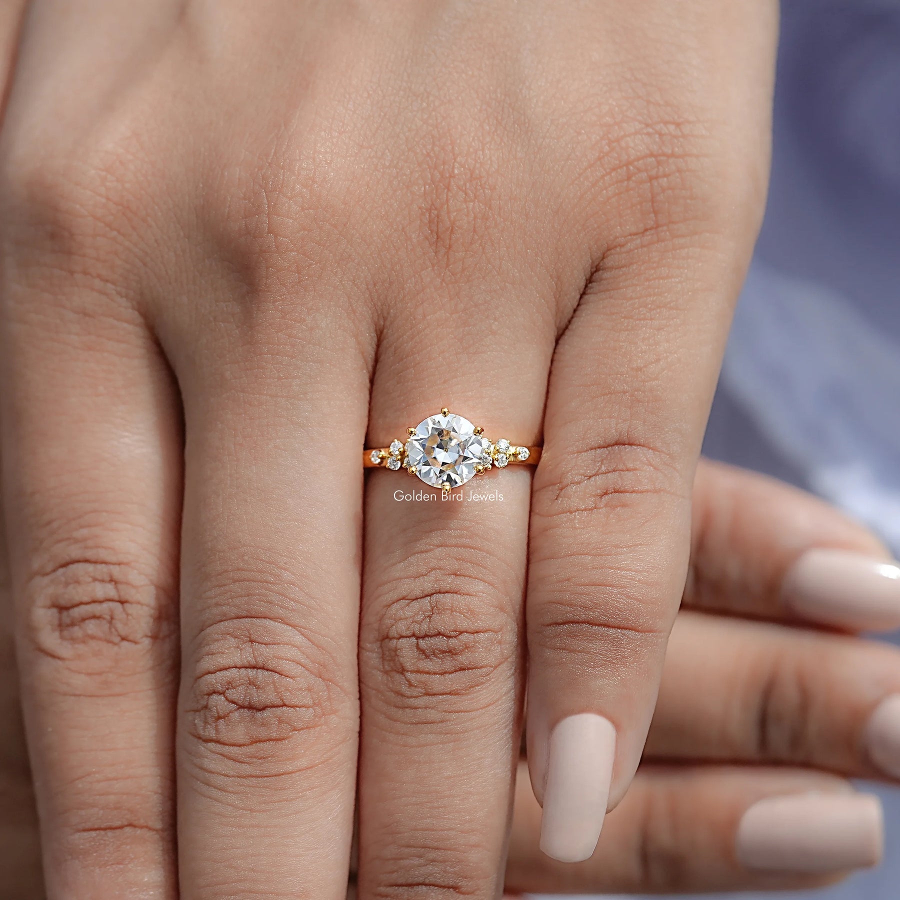 View of Round Cut Moissanite Engagement Ring in prongs setting