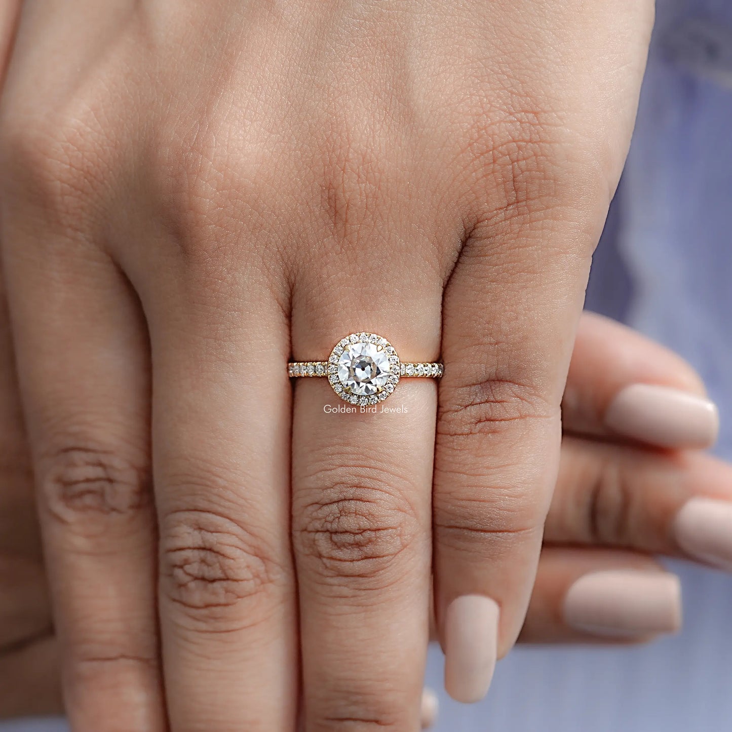 View of Round Cut Moissanite Engagement Ring in prongs setting