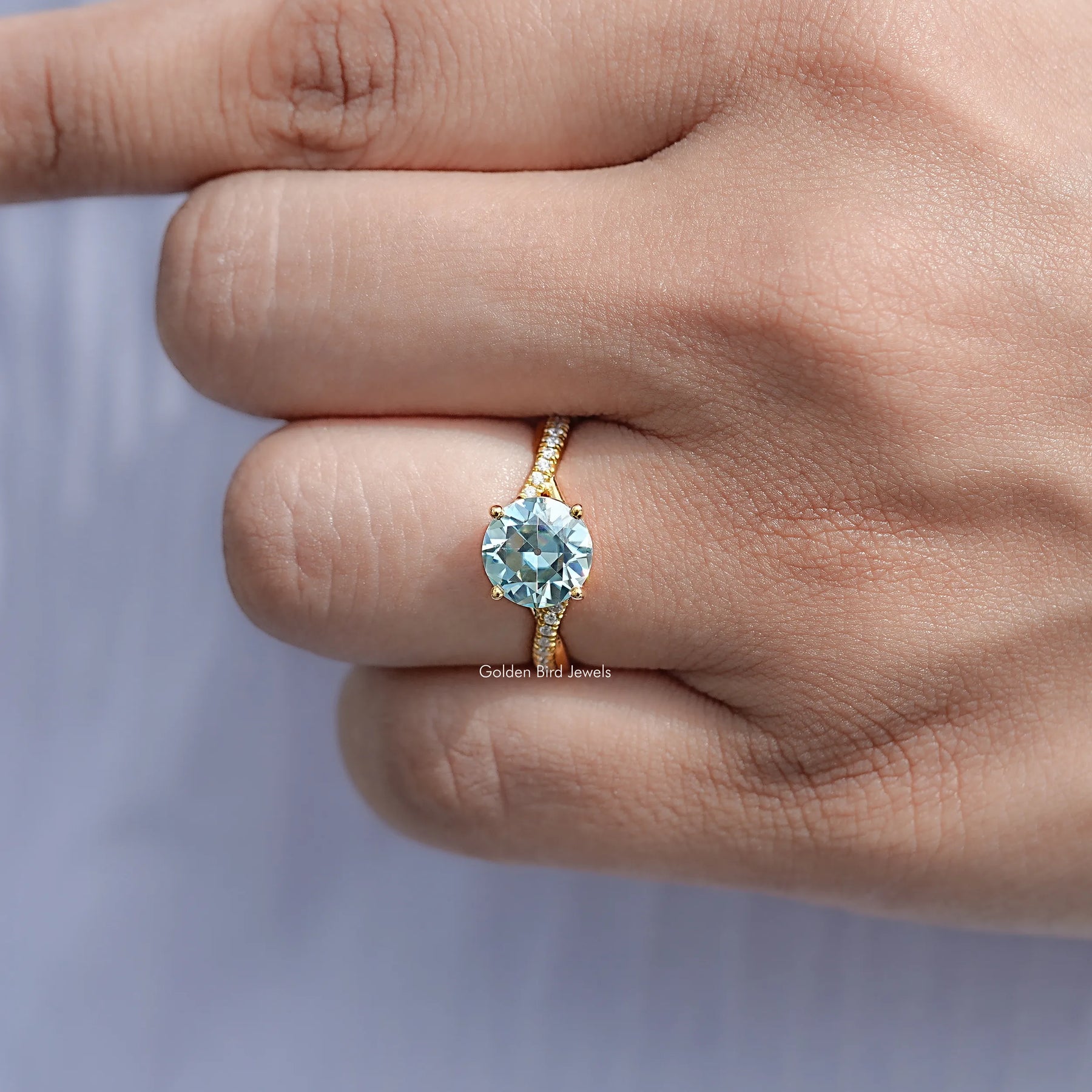 View of Round Cut Moissanite Engagement Ring in prongs setting