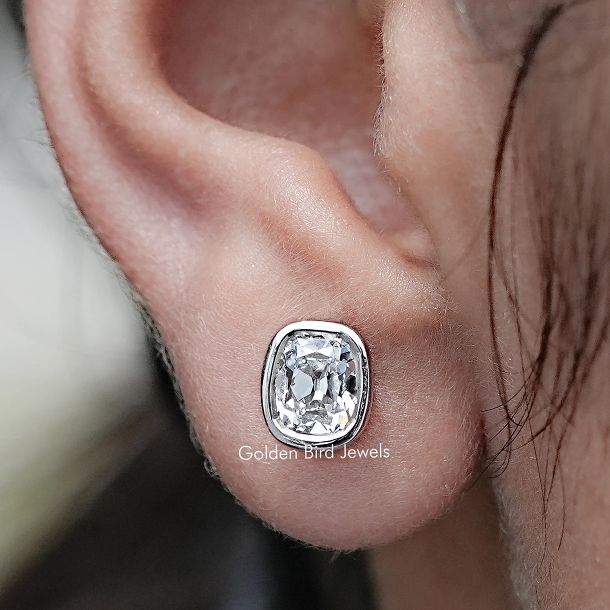 Close up view of  Old Mine Cushion Lab Diamond Stud Earrings
