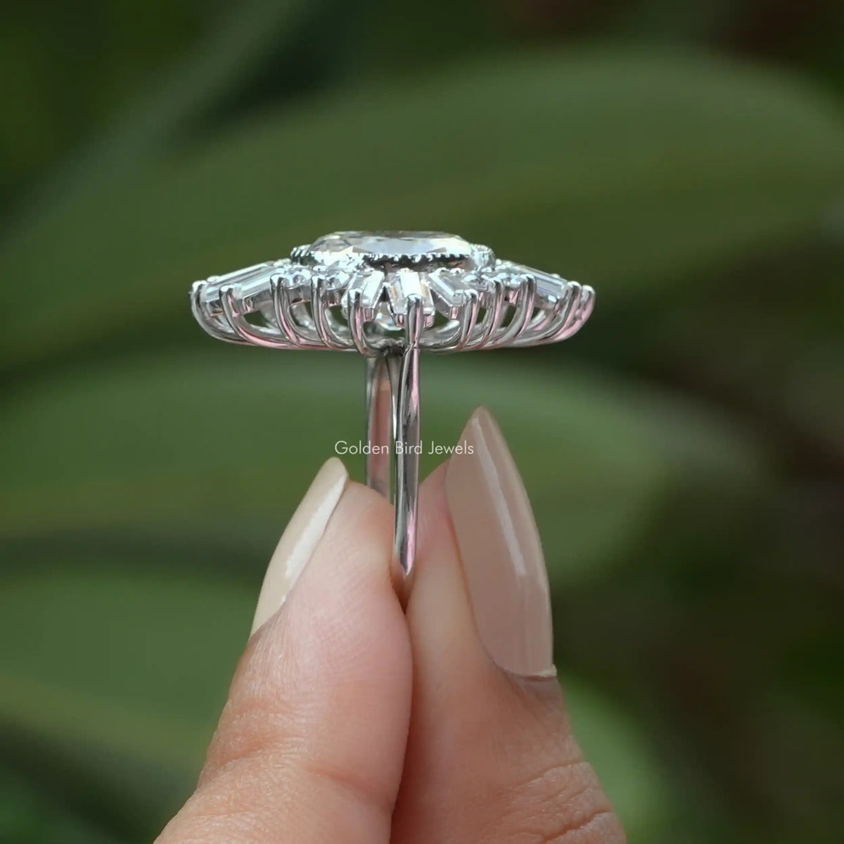 Side View of Old Cushion Cut Moissanite Engagement Ring In two fingers