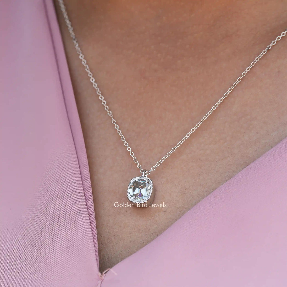 In neck view of Cushion cut statement moissanite halo pendant