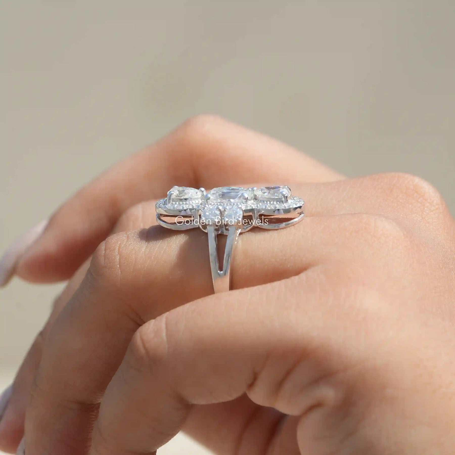 Side View of Cushion And Pear Cut Moissanite Engagement Ring In finger