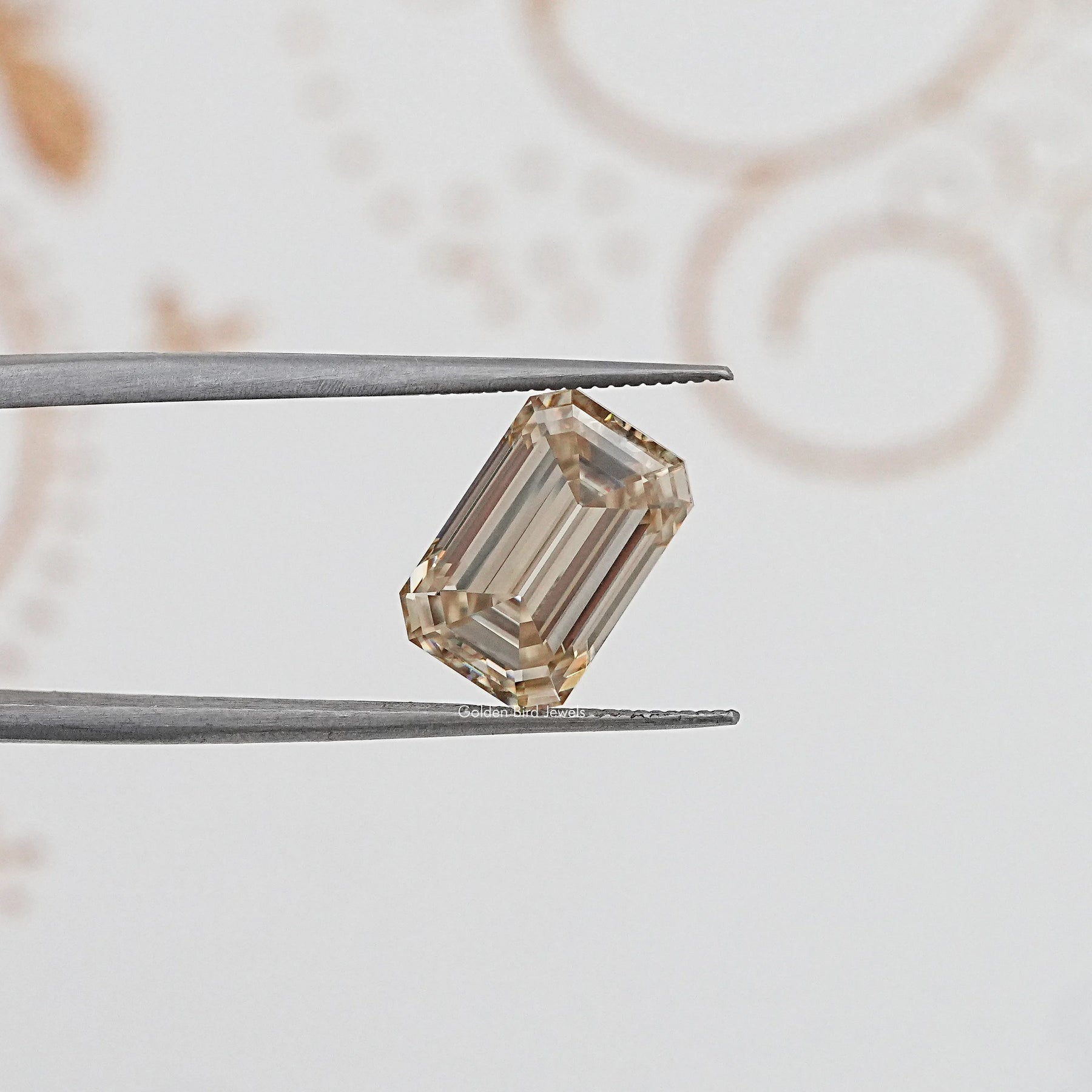 In Tweezer View Of Old Mine Emerald Cut Loose Moissanite Stone
