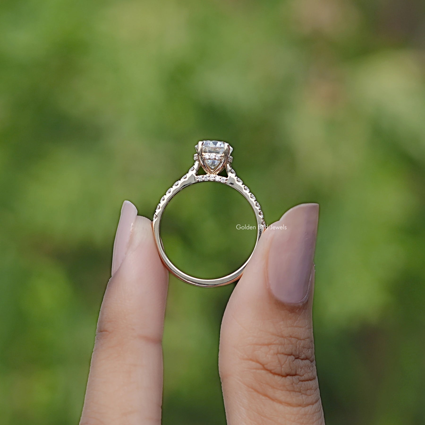 Back view of Oval Moissanite Bridge Cut ring in secure setting