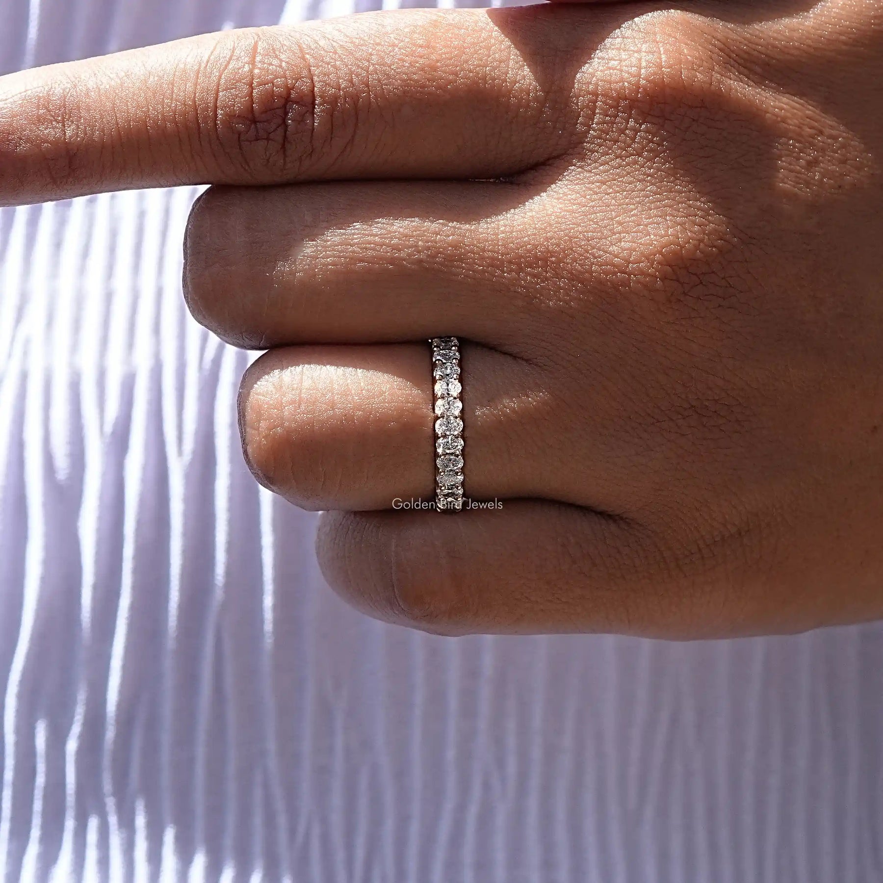 View of Diamond Oval Cut Eternity Band In Finger