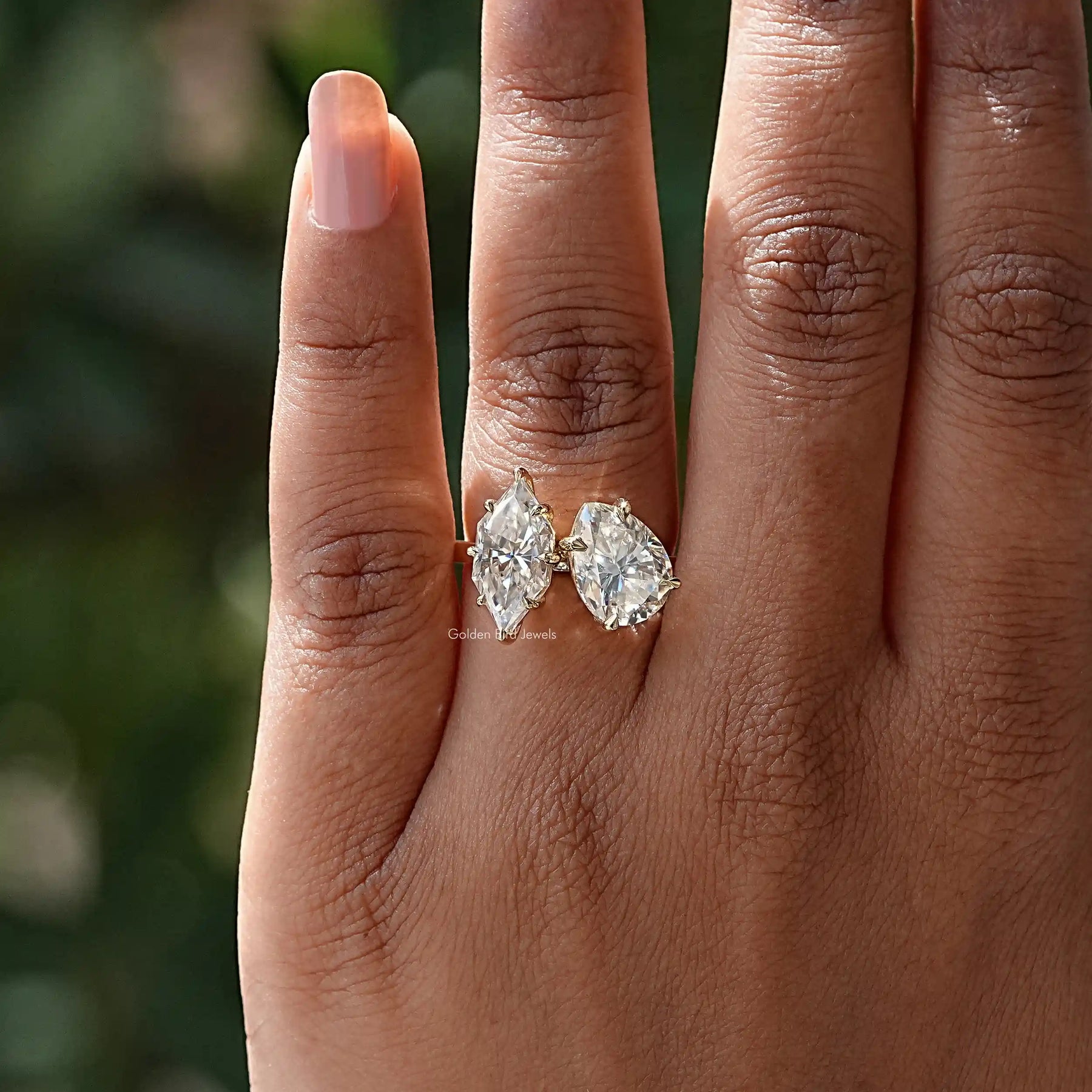 View of Pear And Dutch Marquise Moissanite Ring In Finger