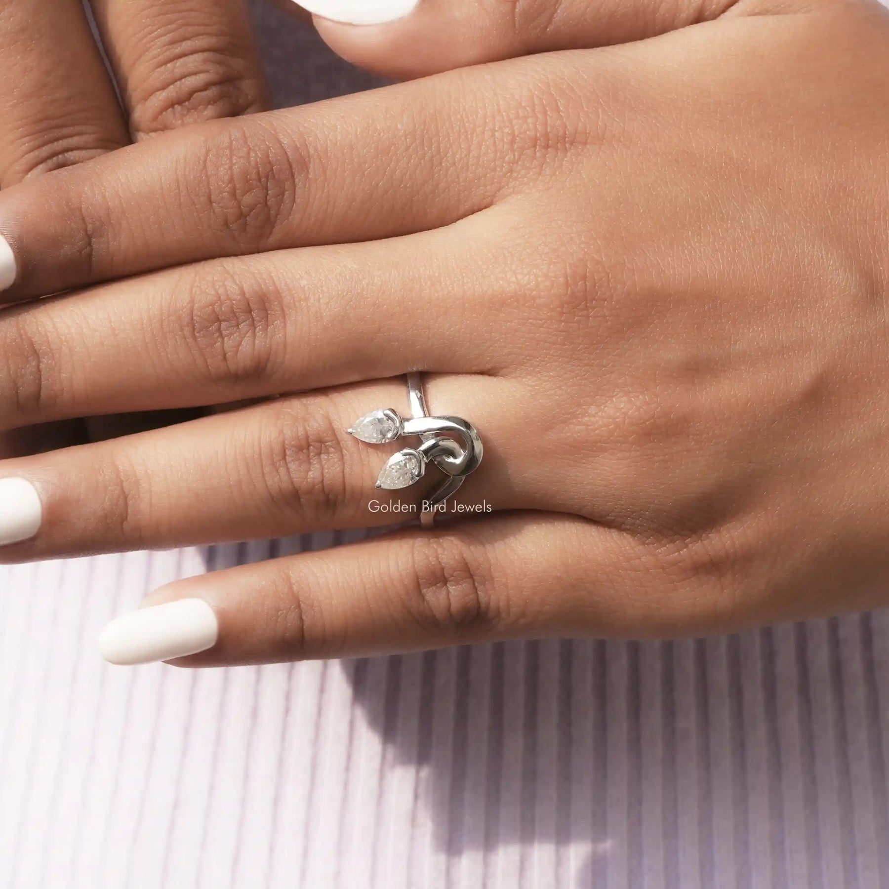 View of Pear Colorless Moissanite Toi Moi Ring In Finger