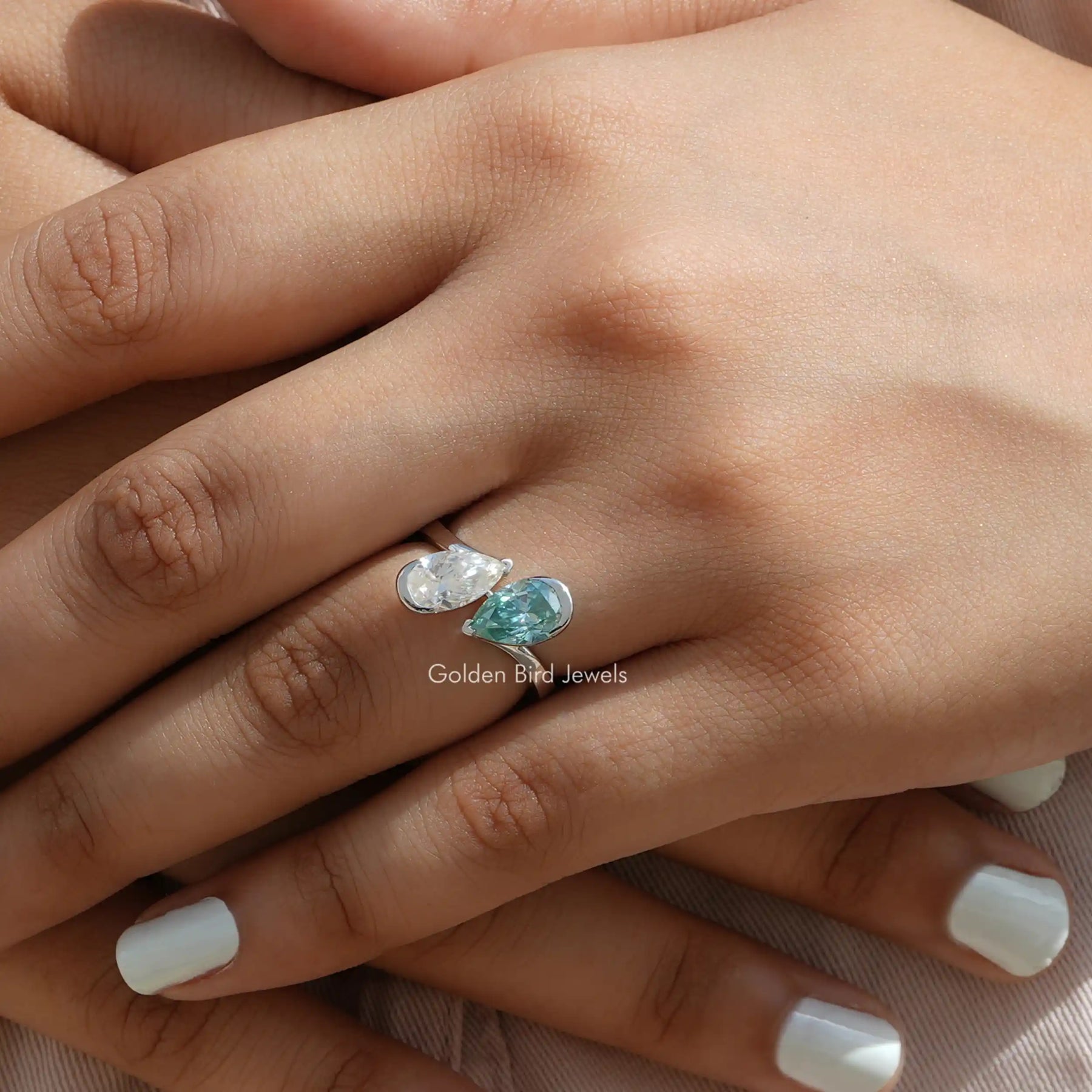 Close up view of toi-et-moi moissanite ring