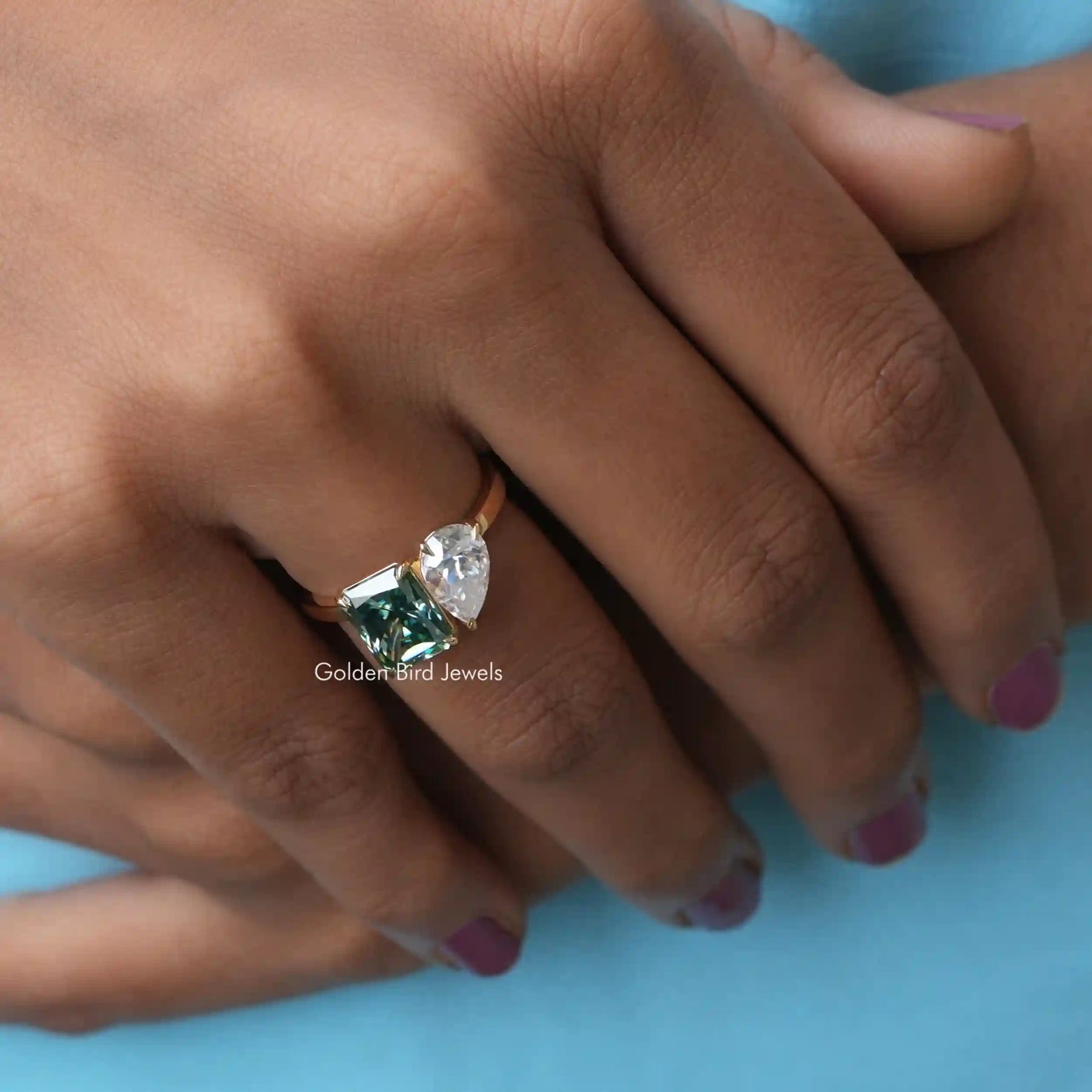 Detailed View of Pear Cut Moissanite Toi Et Moi Ring In Yellow Gold