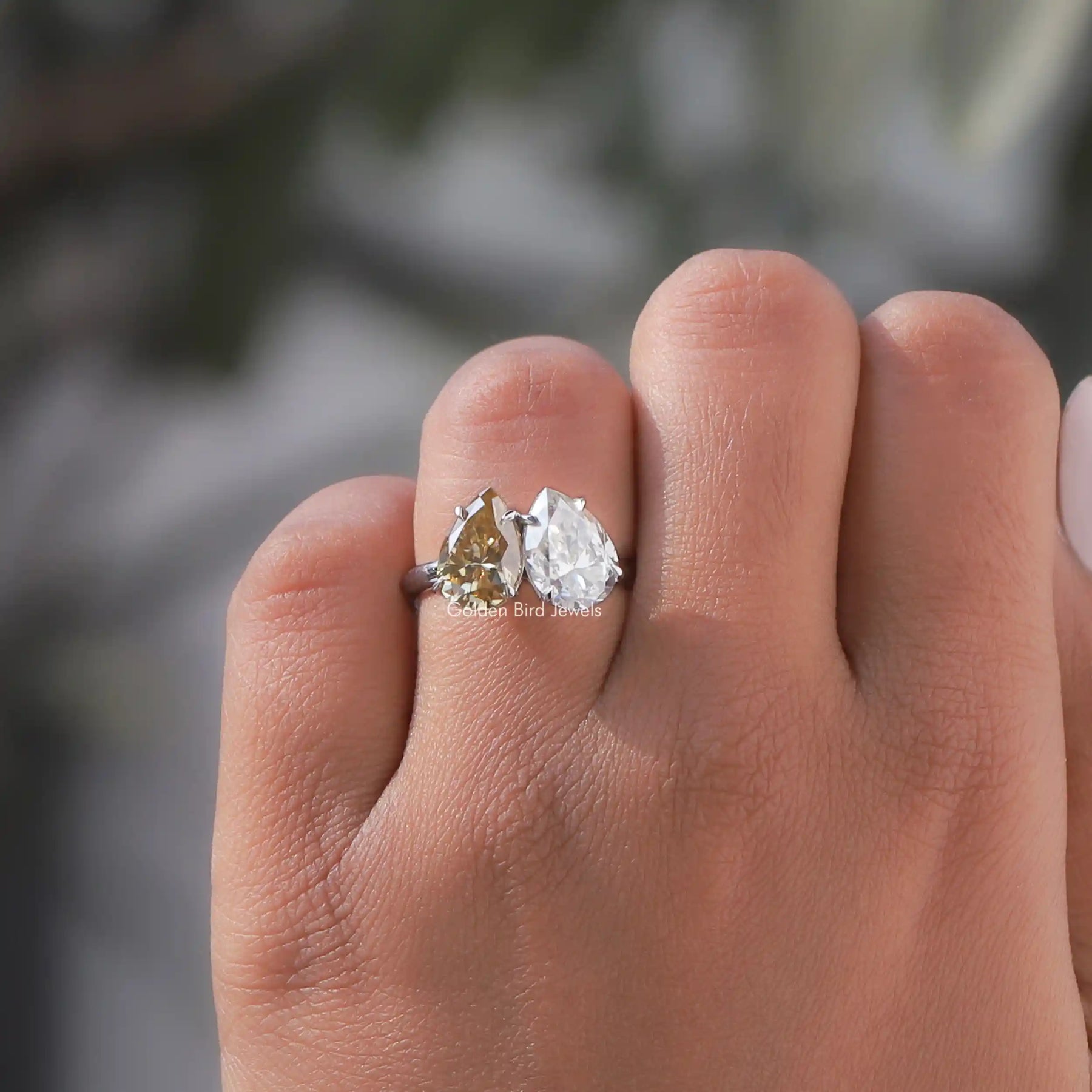 Close-Up View of Toi Et Moi Pear Cut Moissanite Ring In White Gold