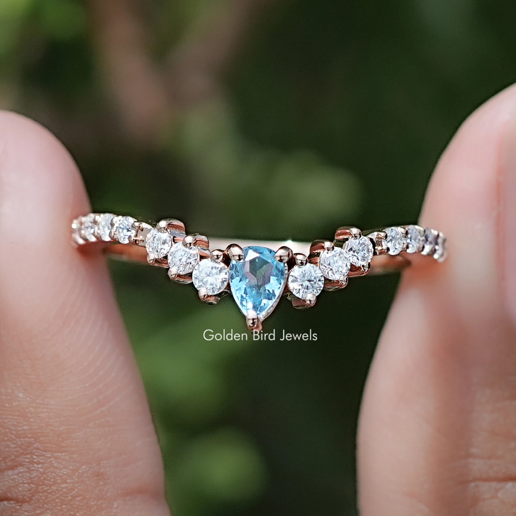 Front view of Pear Gemstone And Round Moissanite Dainty Ring