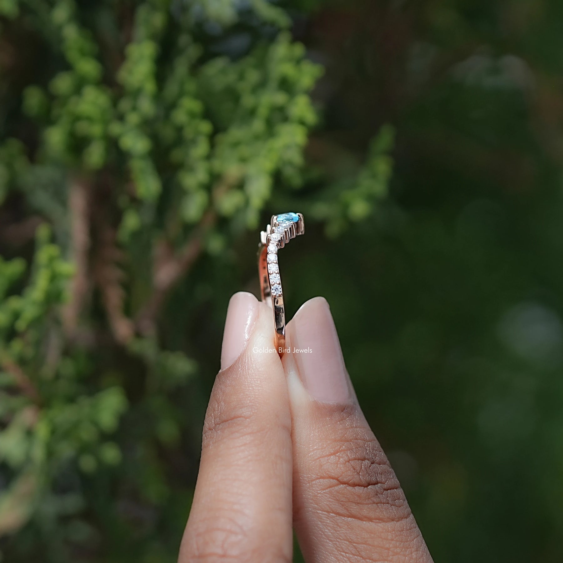 Side View of Pear Gemstone And Round Moissanite Dainty Ring