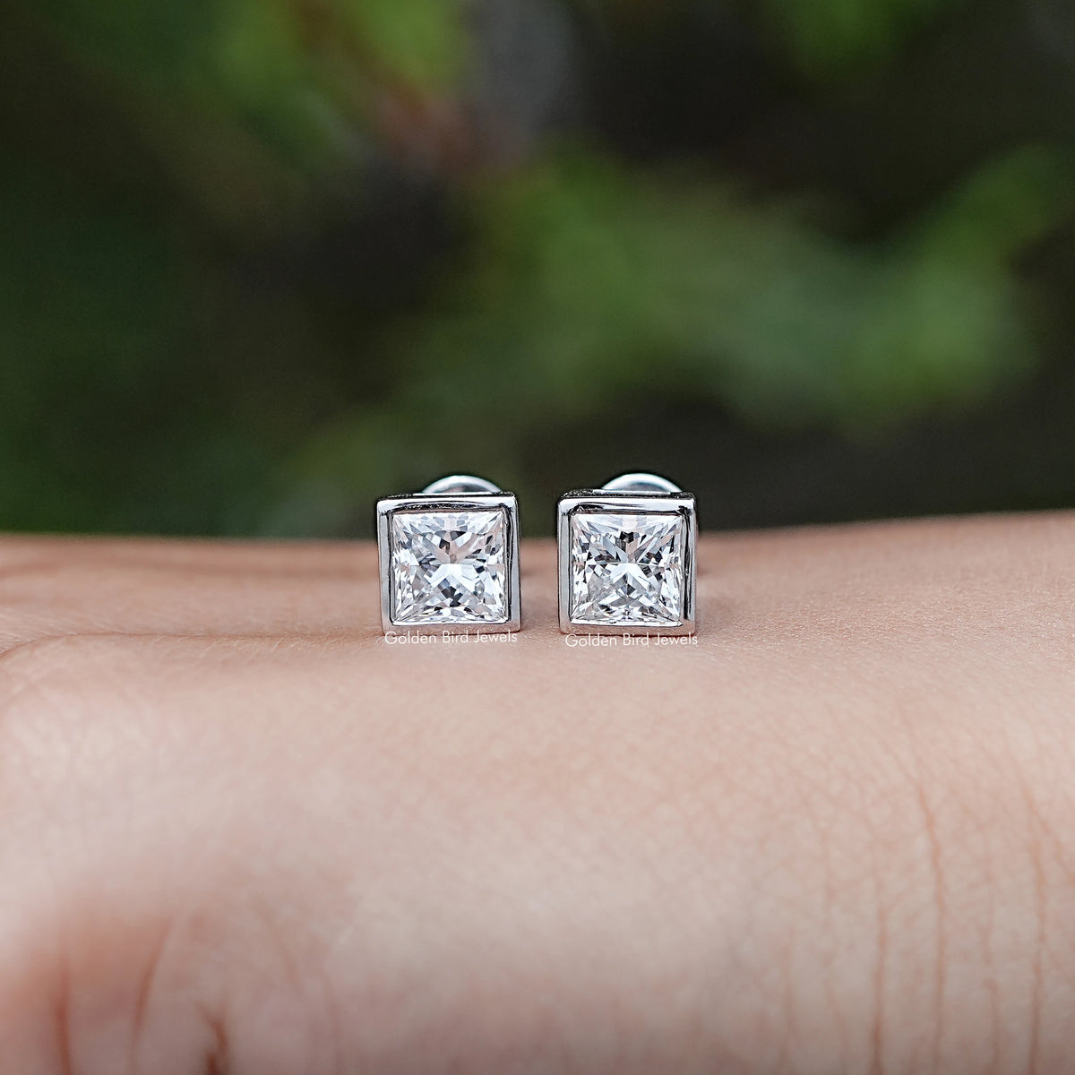 Front view of Lab Diamond Pear Princess Bezel Set Stud Earrings