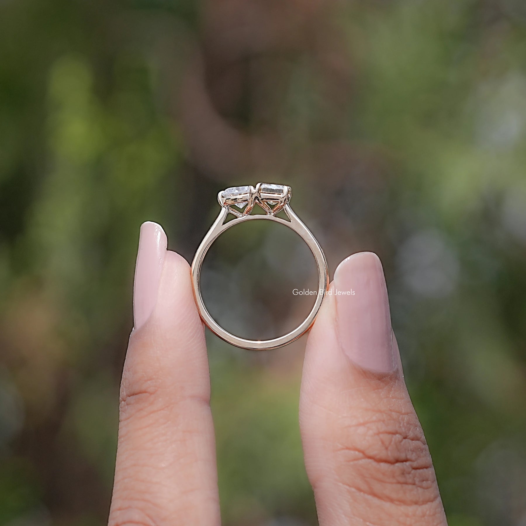 Back view of Radiant And Heart Cut Moissanite Two Stone Ring in secure setting