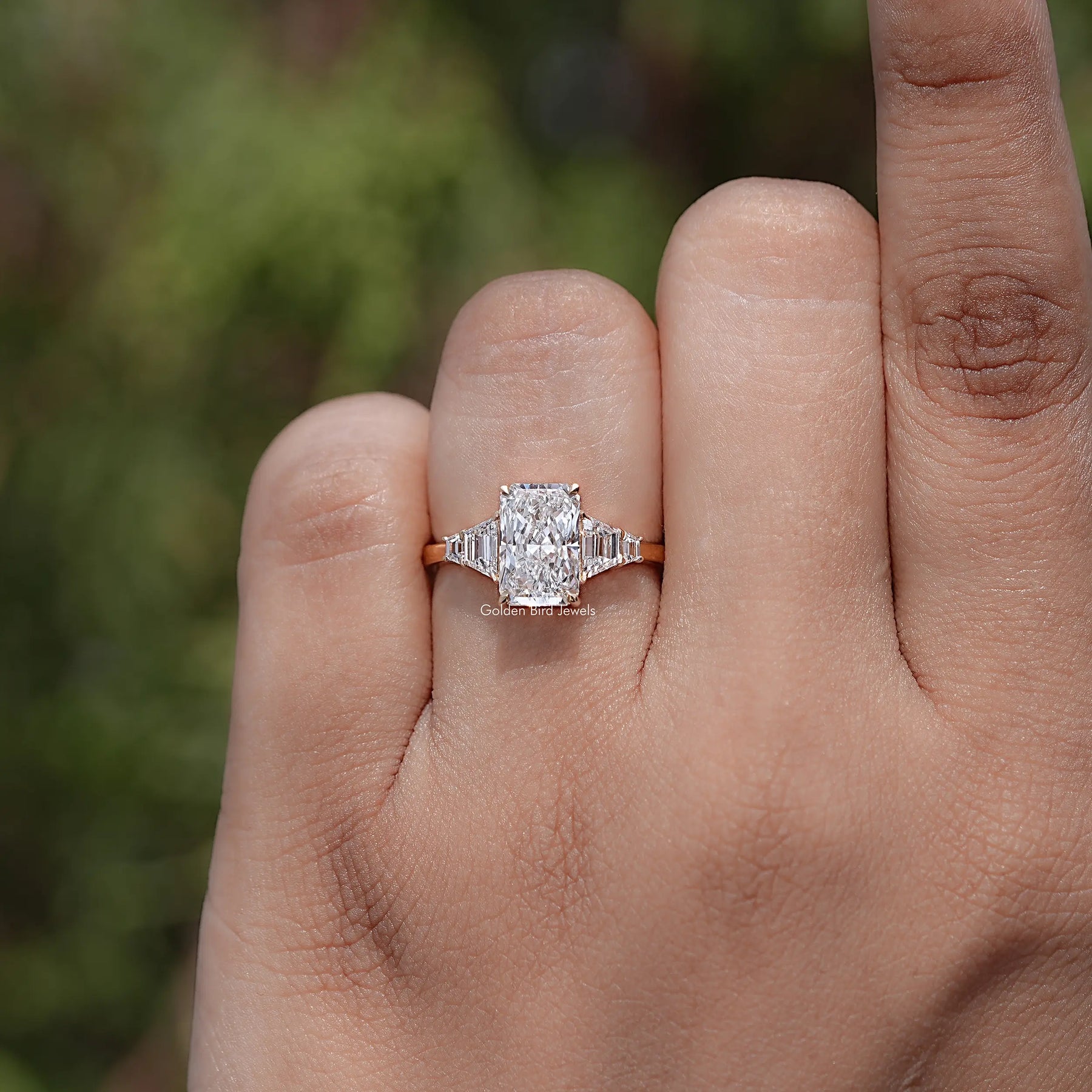 Front view of Radiant And Step Cut Trapezoid Diamond Ring