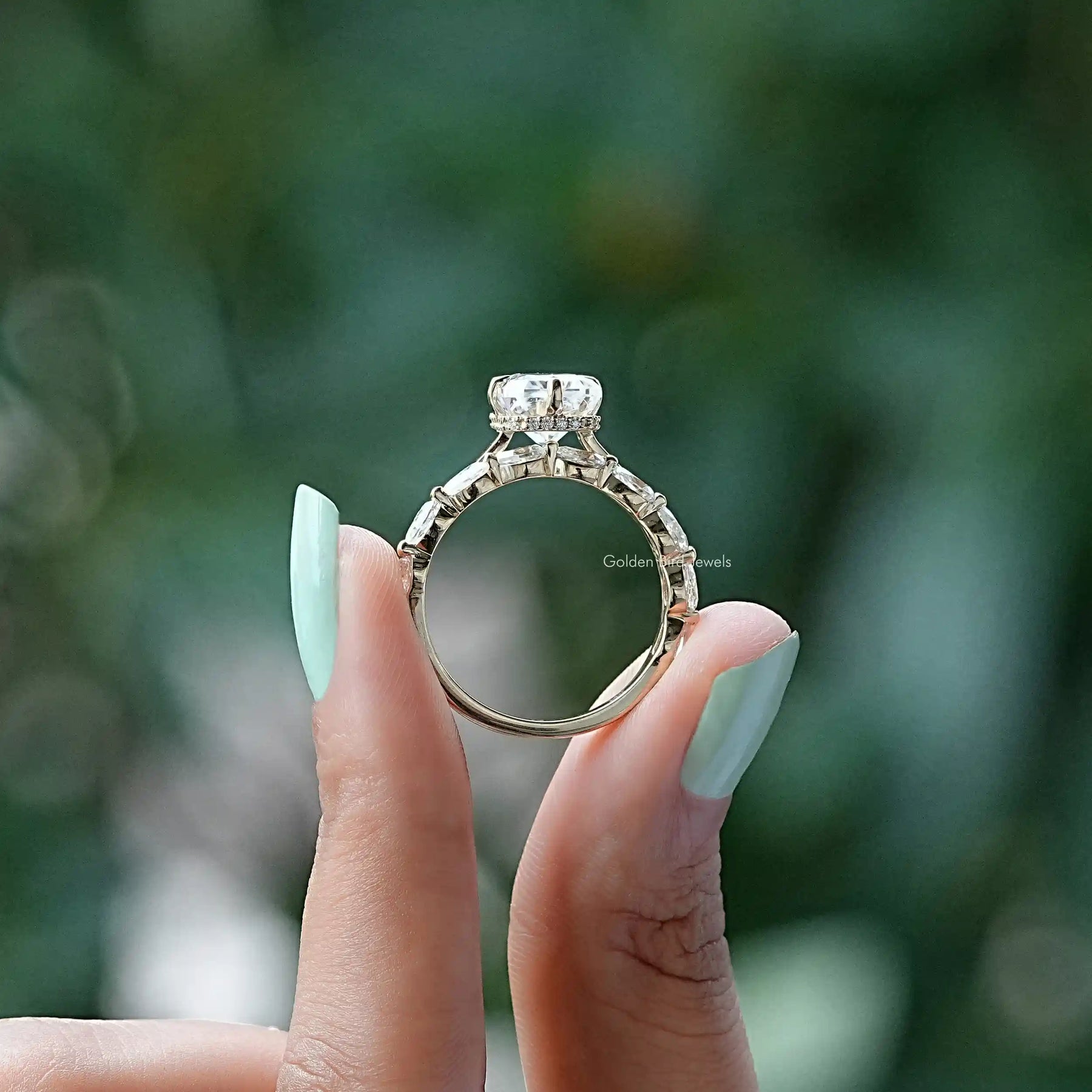 Back View of Radiant Cut Moissanite Hidden Halo Ring In two fingers