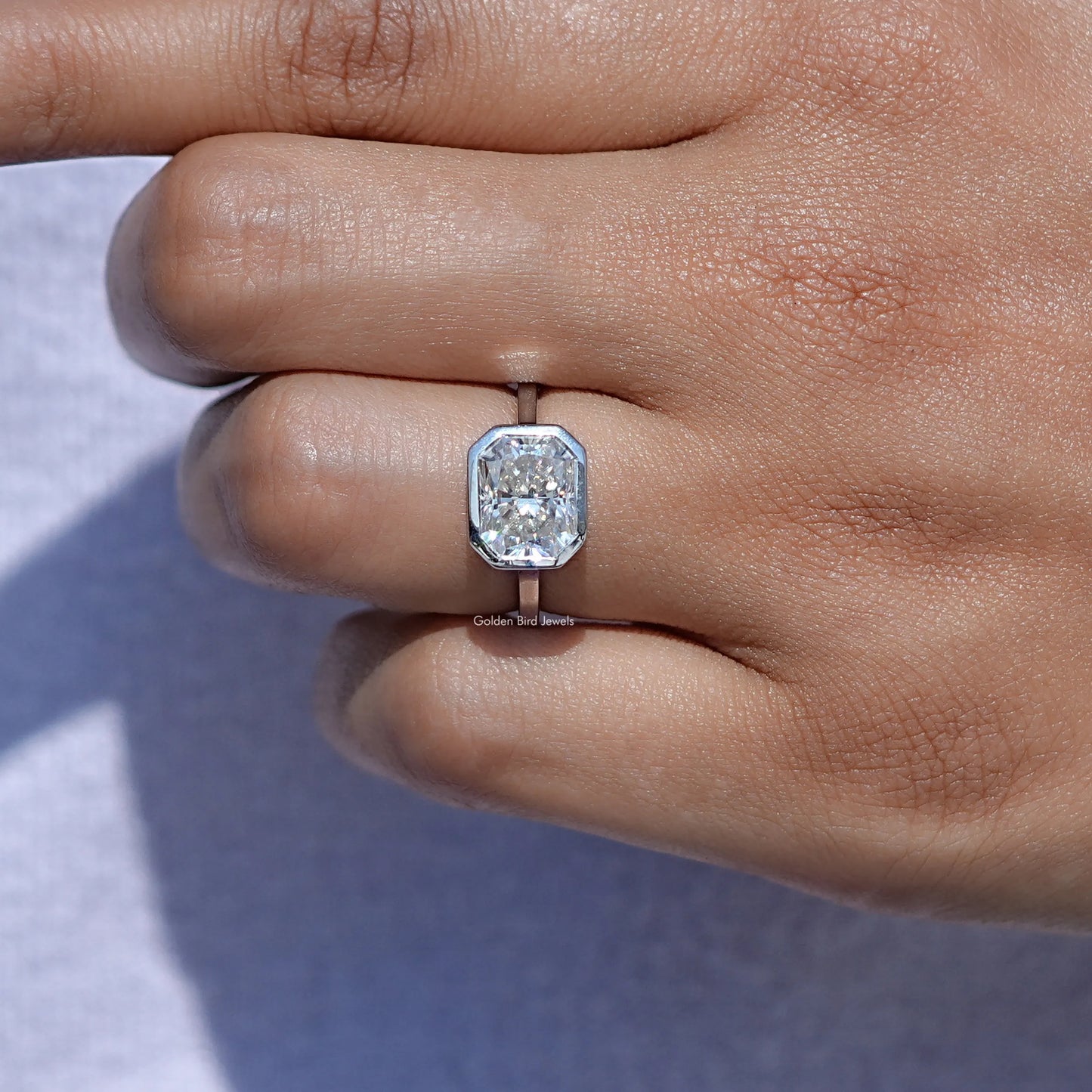 View of Radiant Cut Moissanite Solitaire Ring in prongs setting