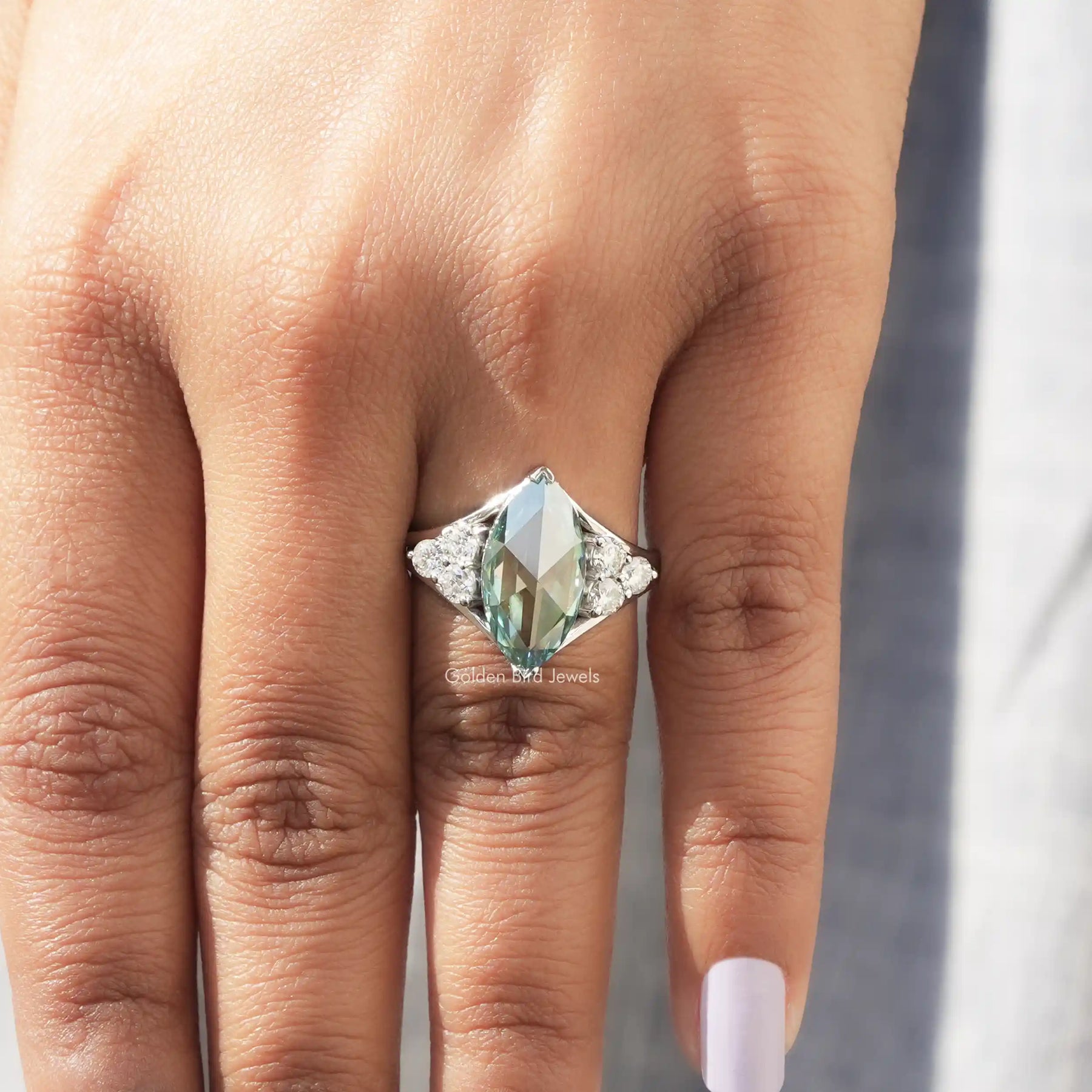 View of Rose Cut Marquise Moissanite Engagement Ring in a fingere