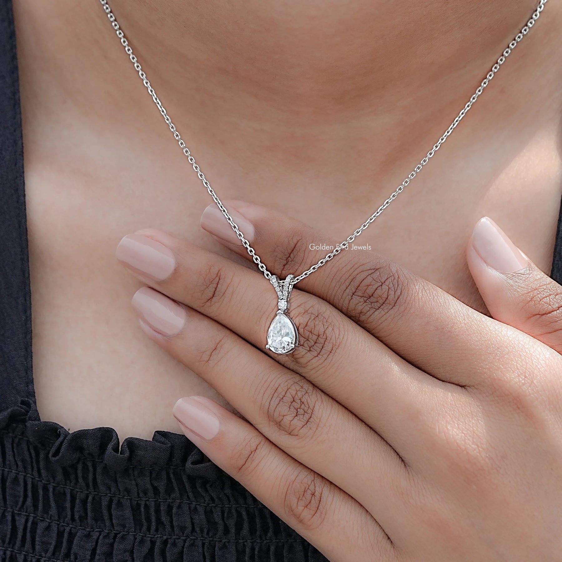 Front View Of Round And Pear Cut solitaire pendant