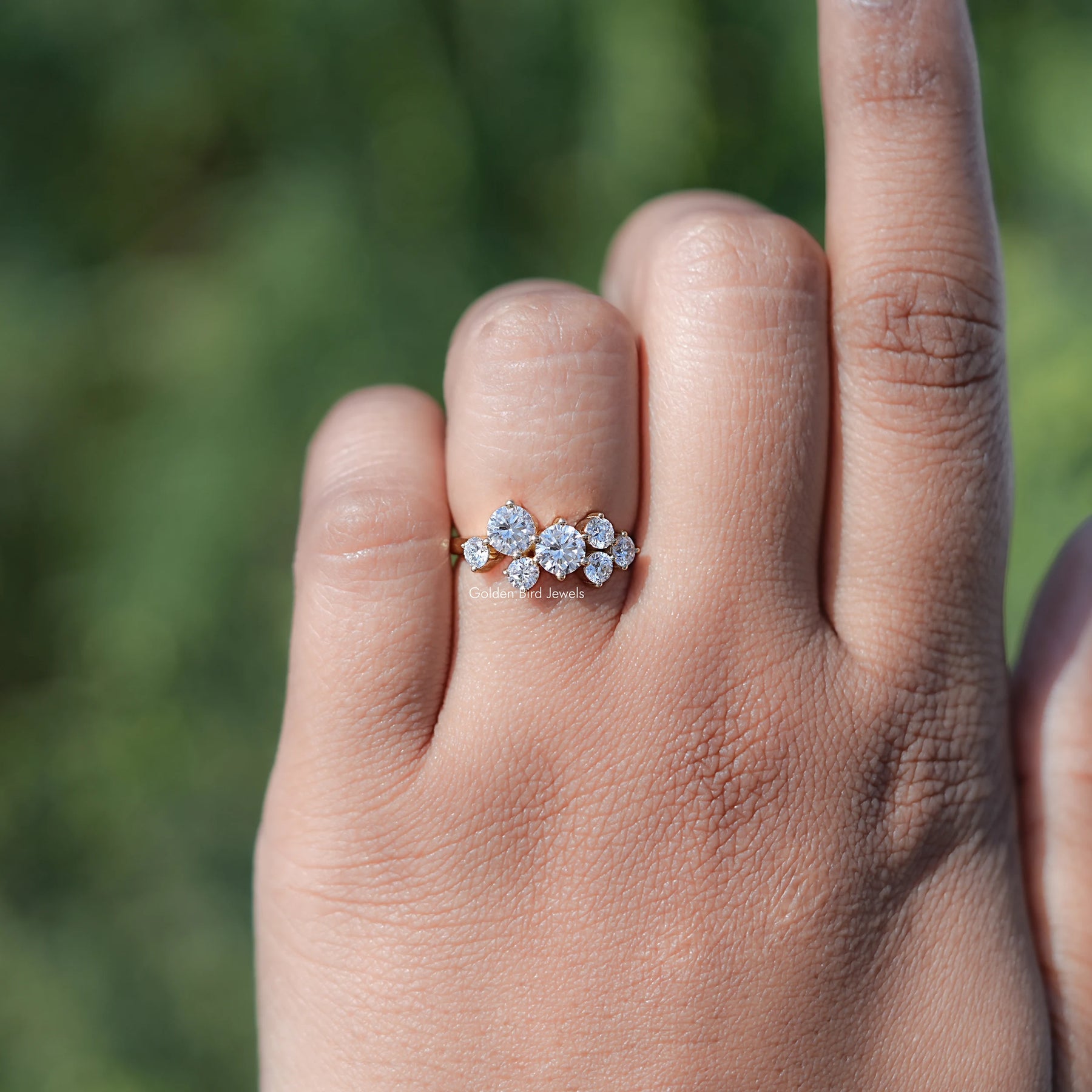 In finger view of Round Shaped Solitaire Moissanite Ring