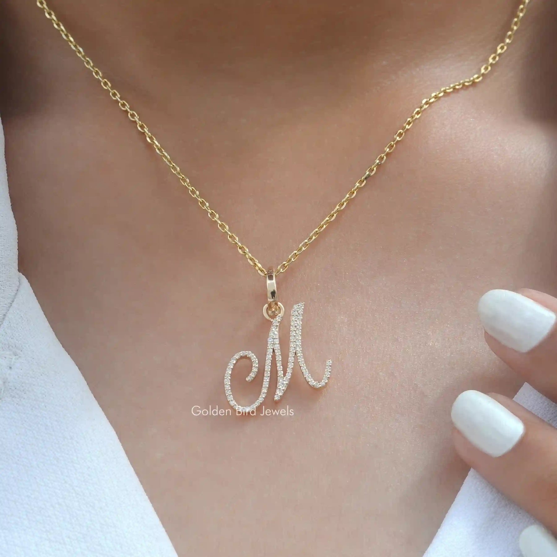 In neck view of round cut moissanite halo pendant