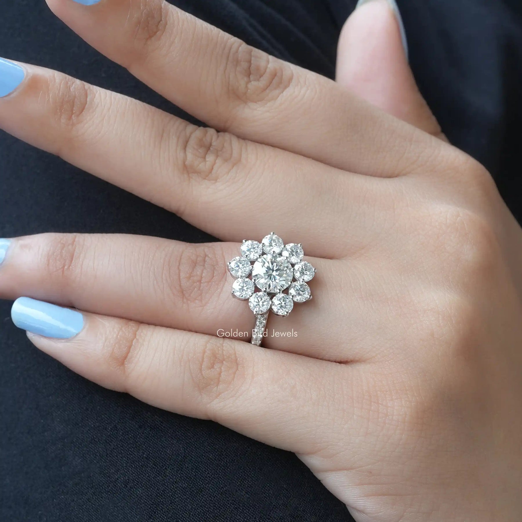 View of Moissanite Floral Halo Engagement Ring In Finger