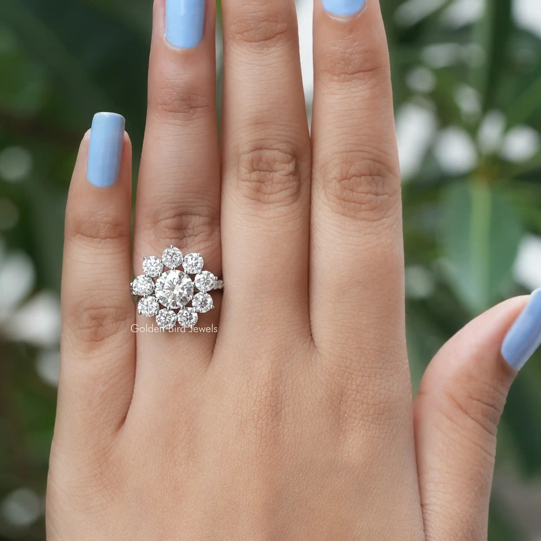 View of Moissanite Round Cut Halo Ring In Finger